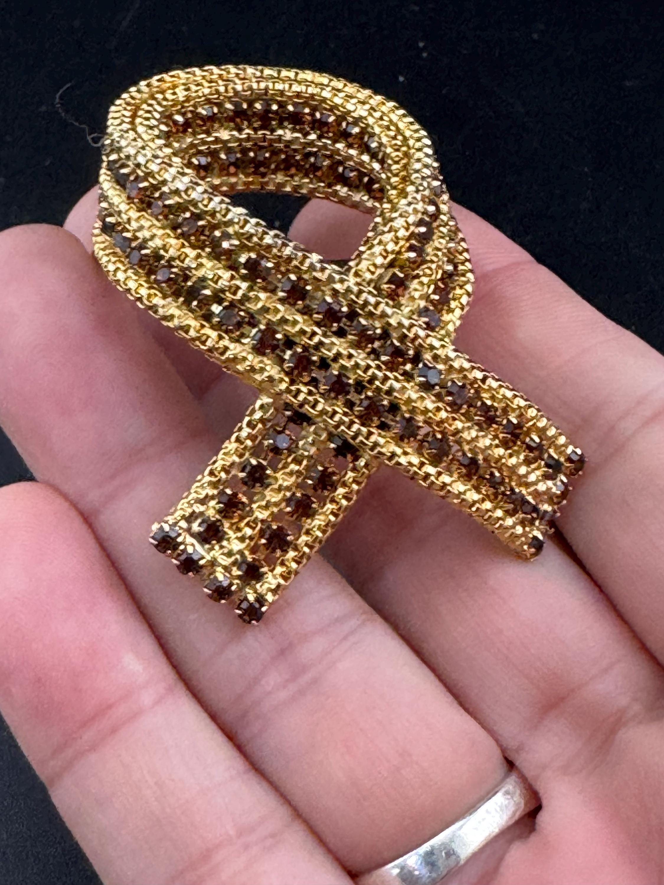 vintage gold tone mesh brown cognac glass rhinestone cross knot brooch 1960s