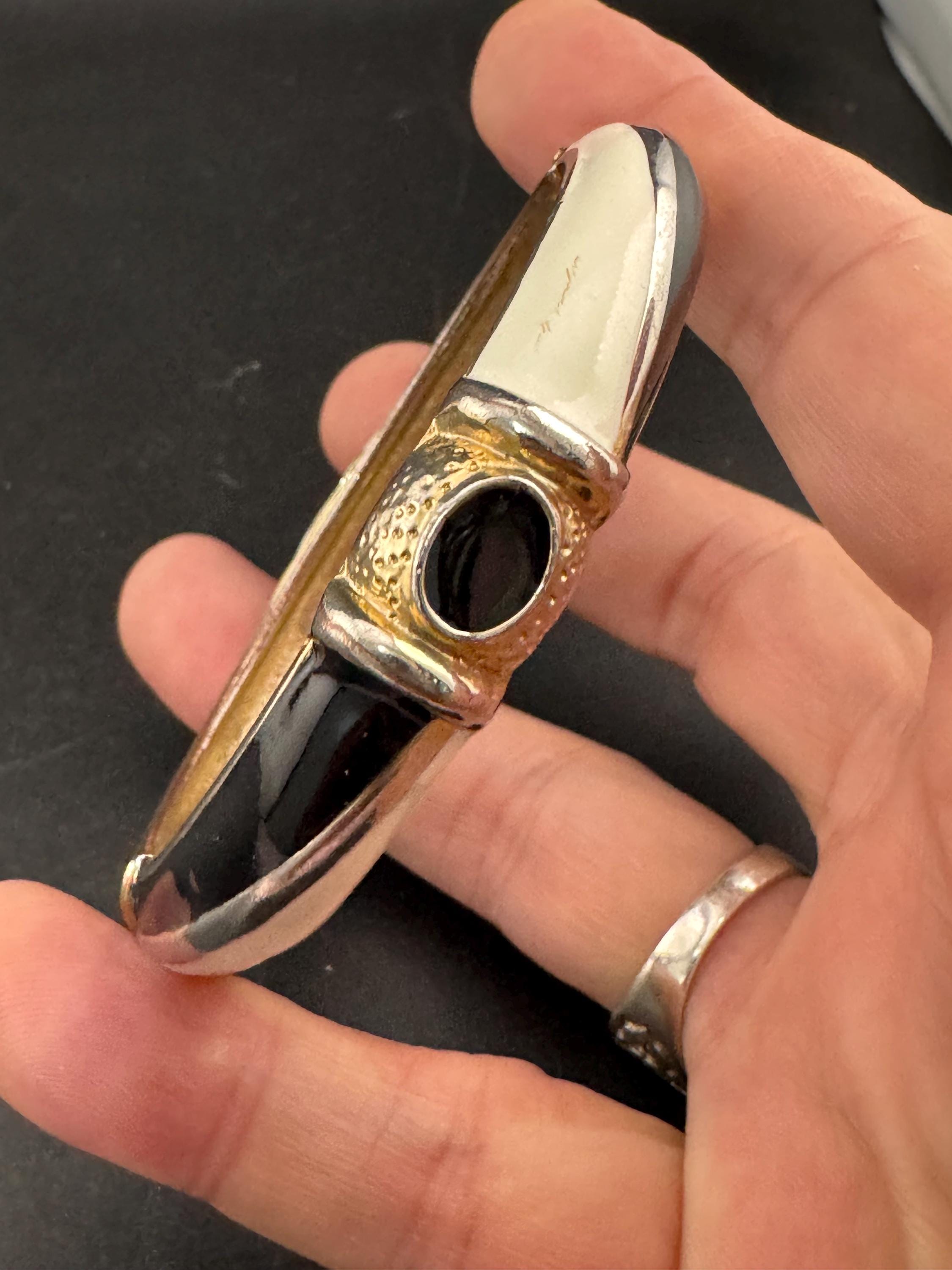Vintage cream and black enamel hinged clamper bangle , 80s