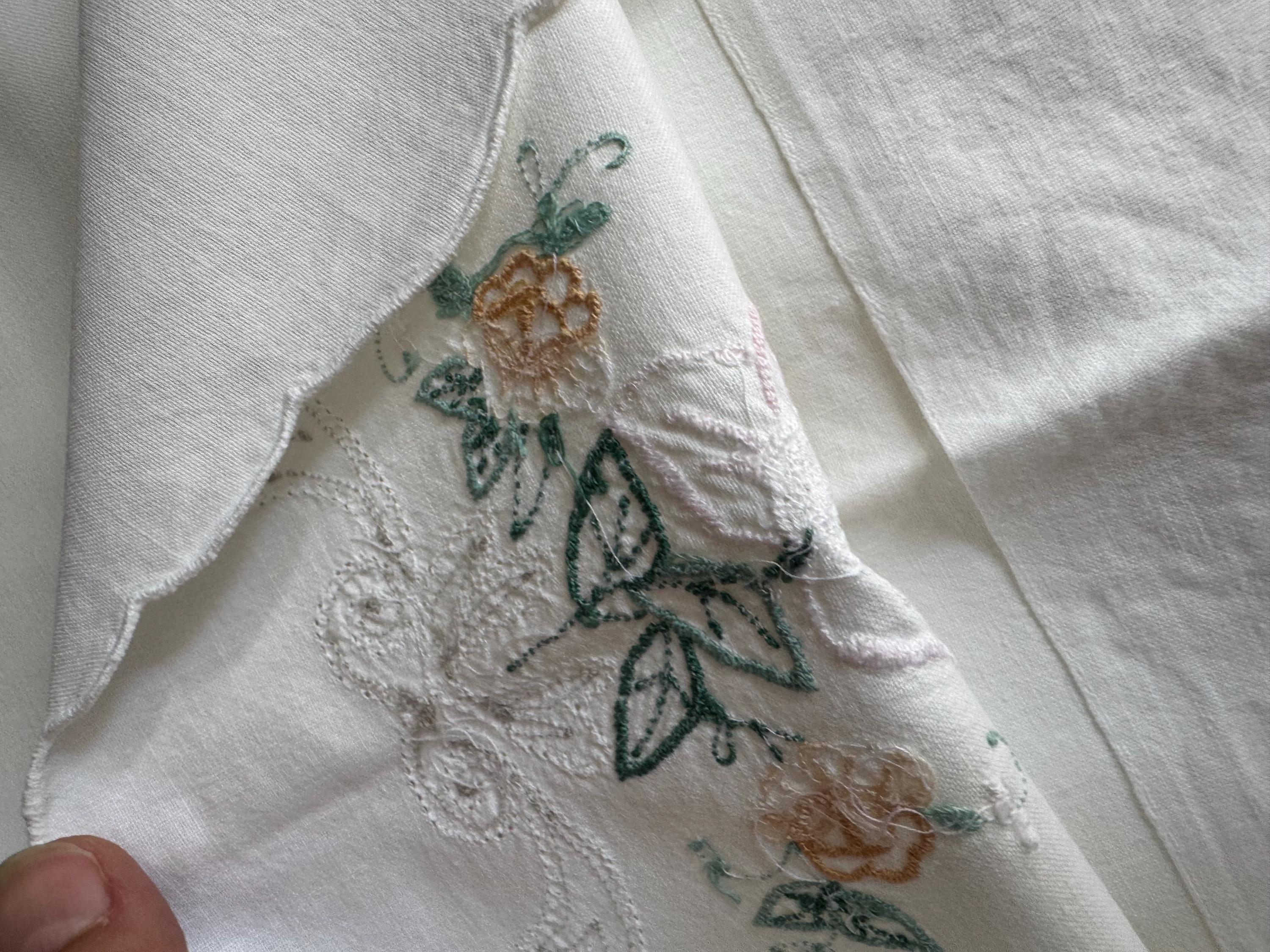 Pair of white cotton embroidered floral pillowcases peach purple  green