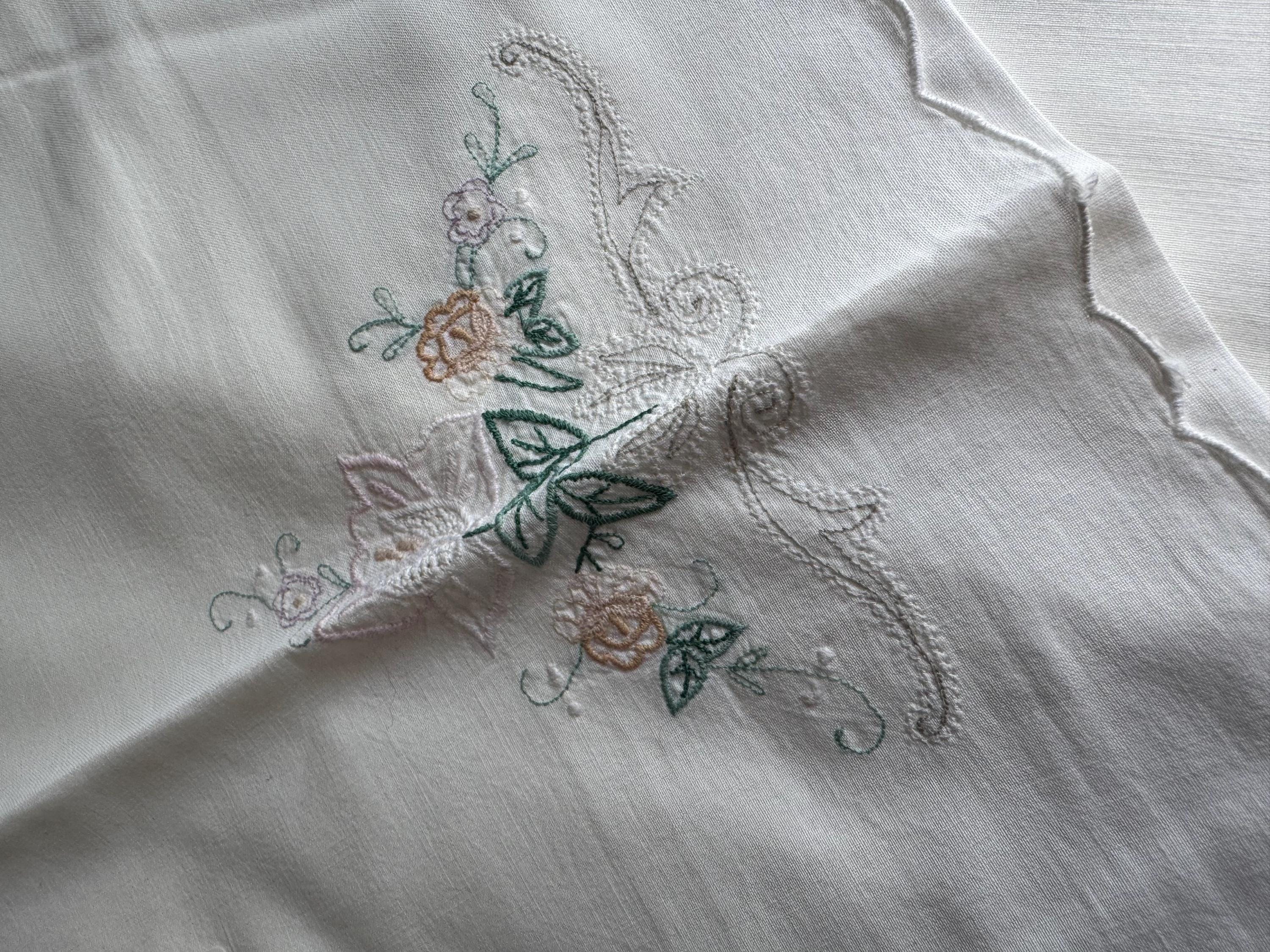 Pair of white cotton embroidered floral pillowcases peach purple  green