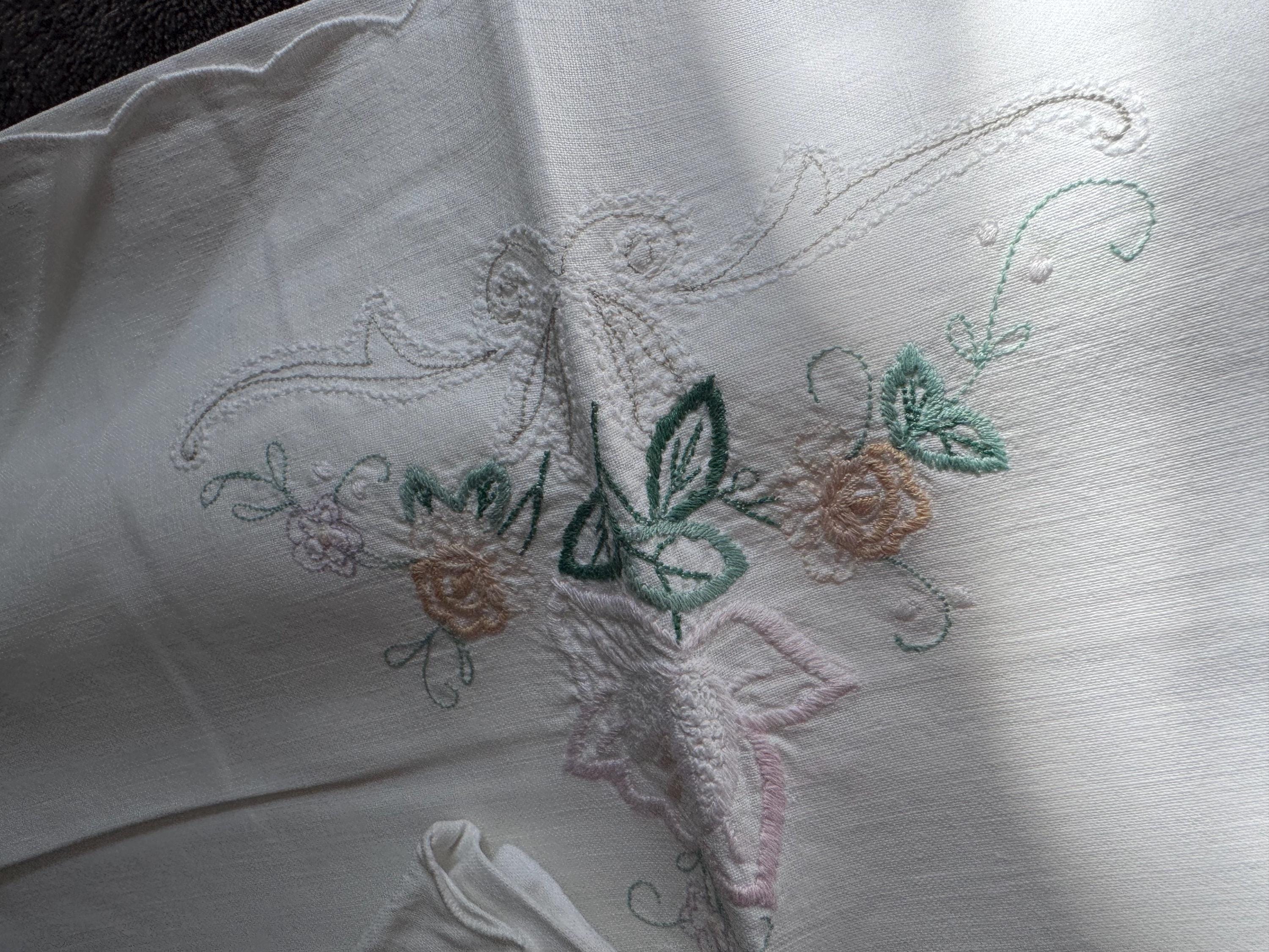Pair of white cotton embroidered floral pillowcases peach purple  green