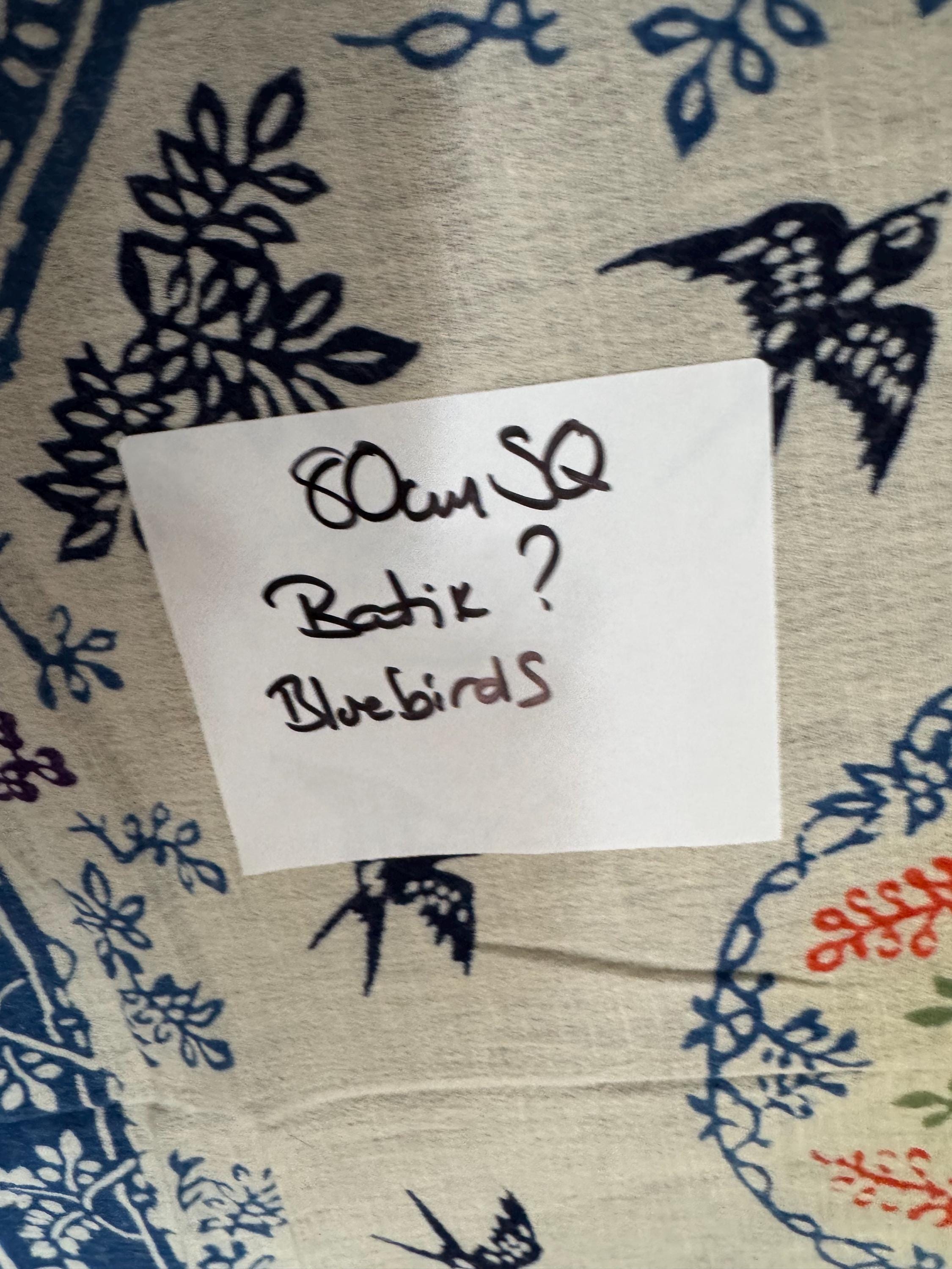 80cm square boho vintage batik print tablecloth printed with bluebirds and orange and blue florals