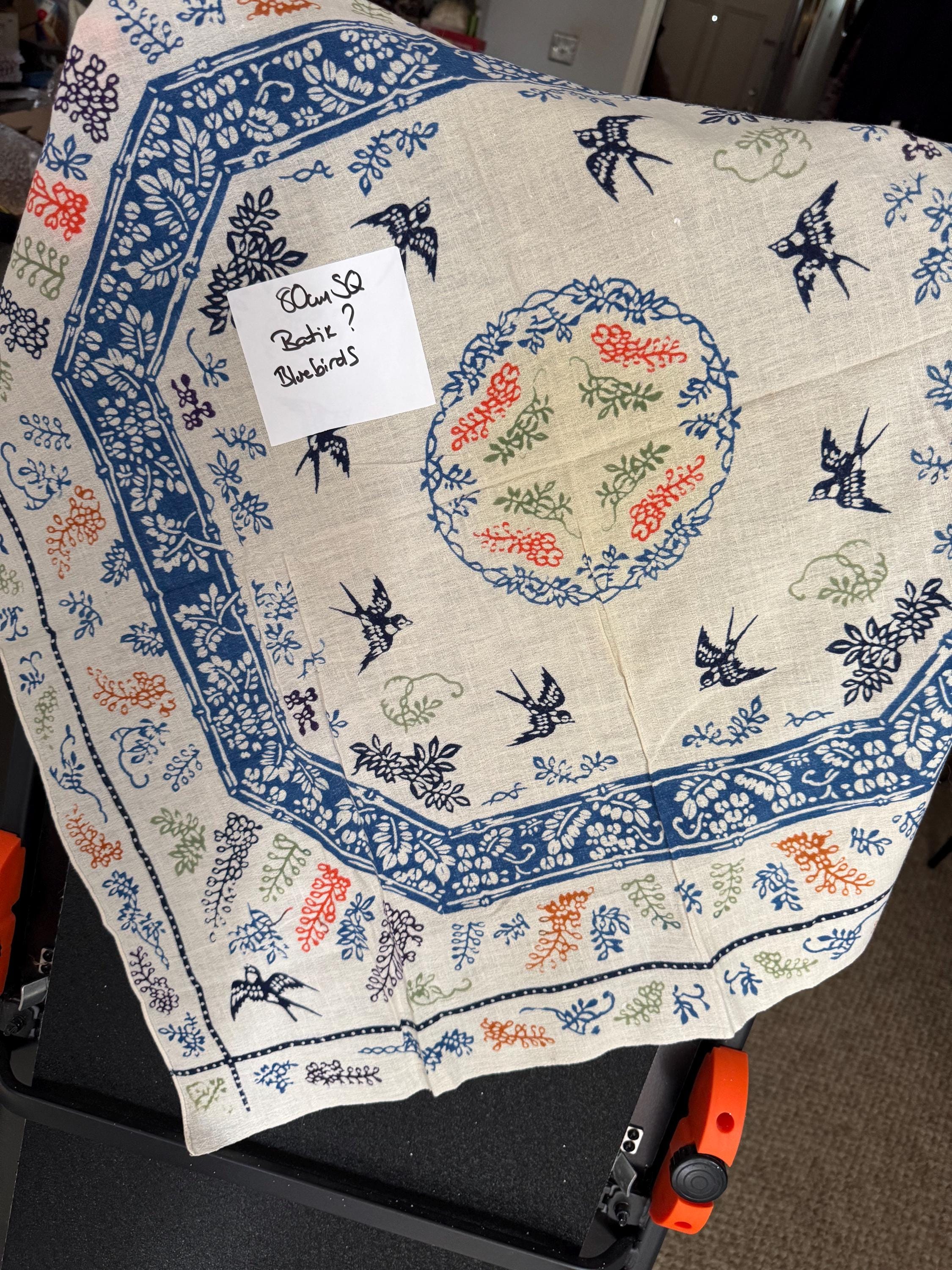 80cm square boho vintage batik print tablecloth printed with bluebirds and orange and blue florals