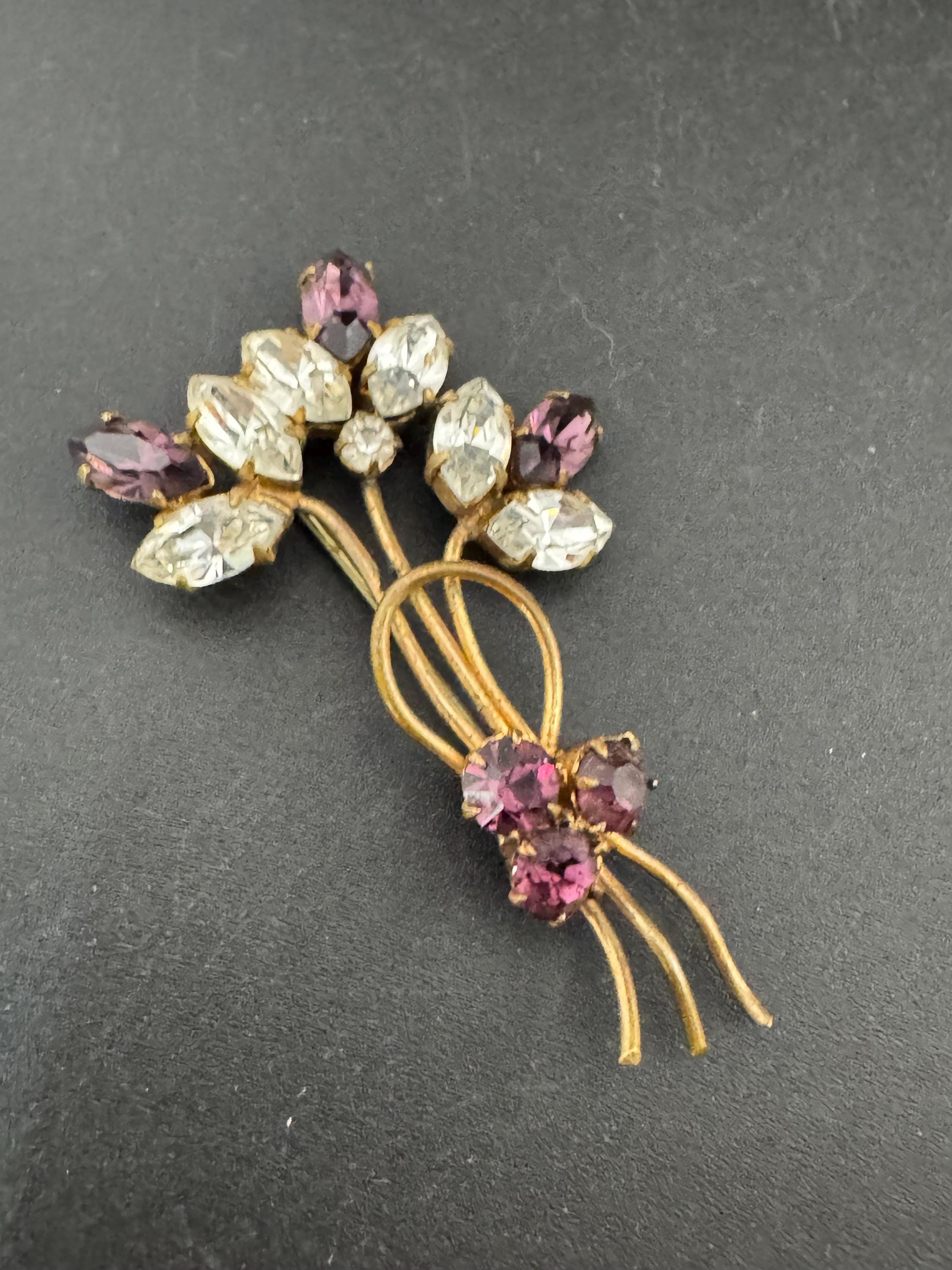 Vintage dainty amethyst purple glass rhinestone gold tone floral brooch , mid century
