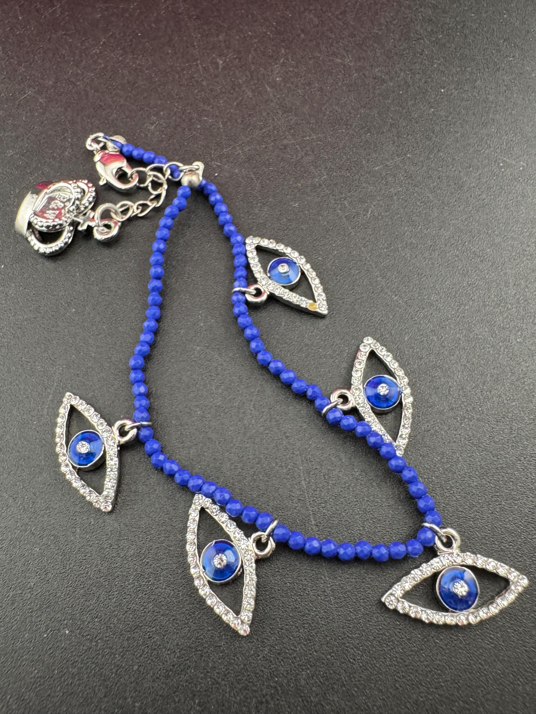 Retro Butler and Wilson boxed dainty clear diamanté blue evil eye silver tone tennis charm bracelet