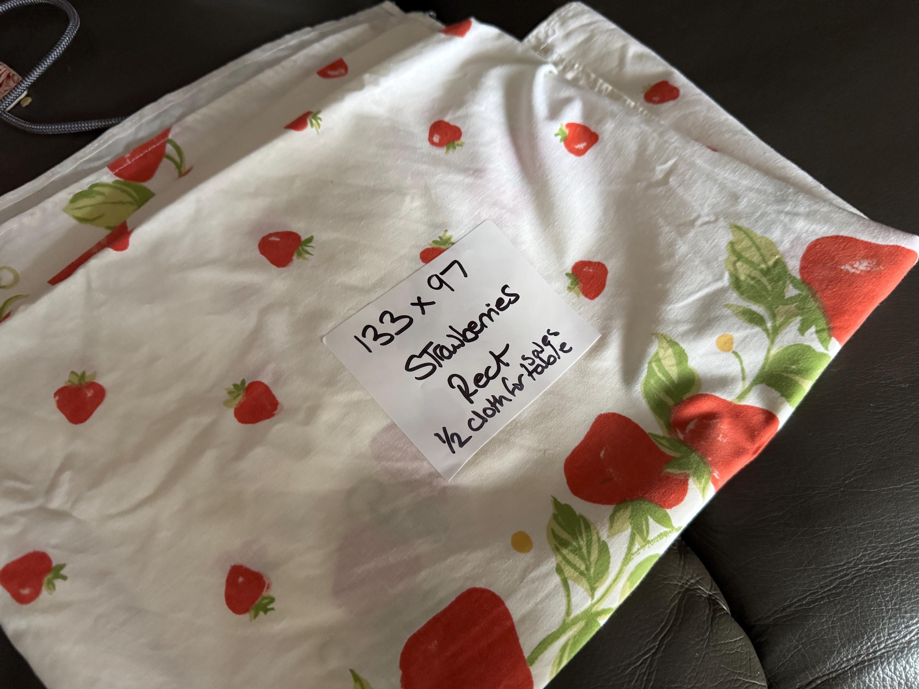 133cm x 96cm half size tablecloth with summer strawberry design … ideal for a smallholder selling fruit or preserves. Perfect size !