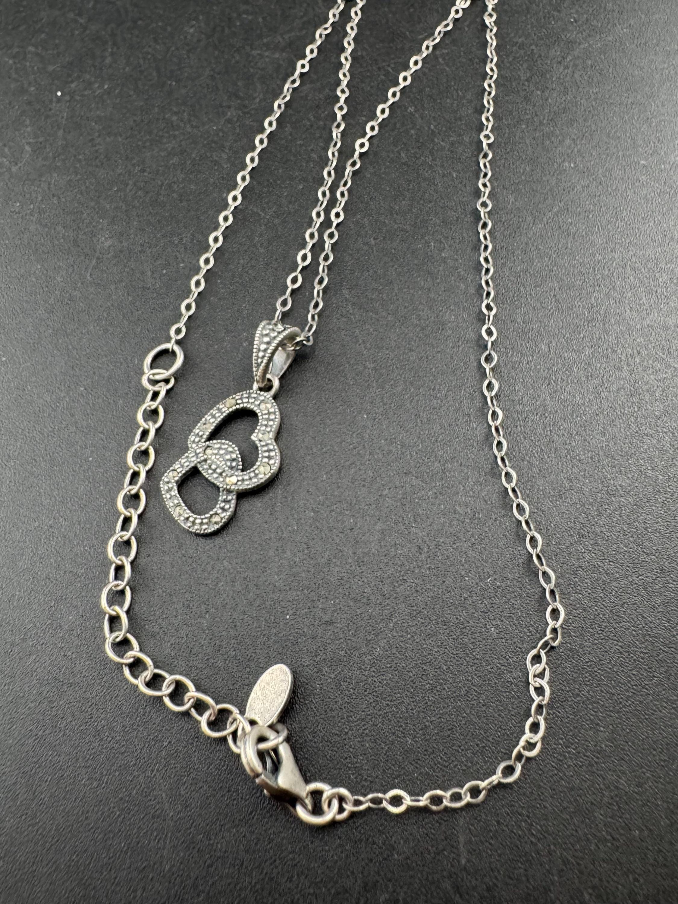 sterling silver and marcasite double love heart shaped pendant 3cm 3.6 grams on a 46cm 925 chain