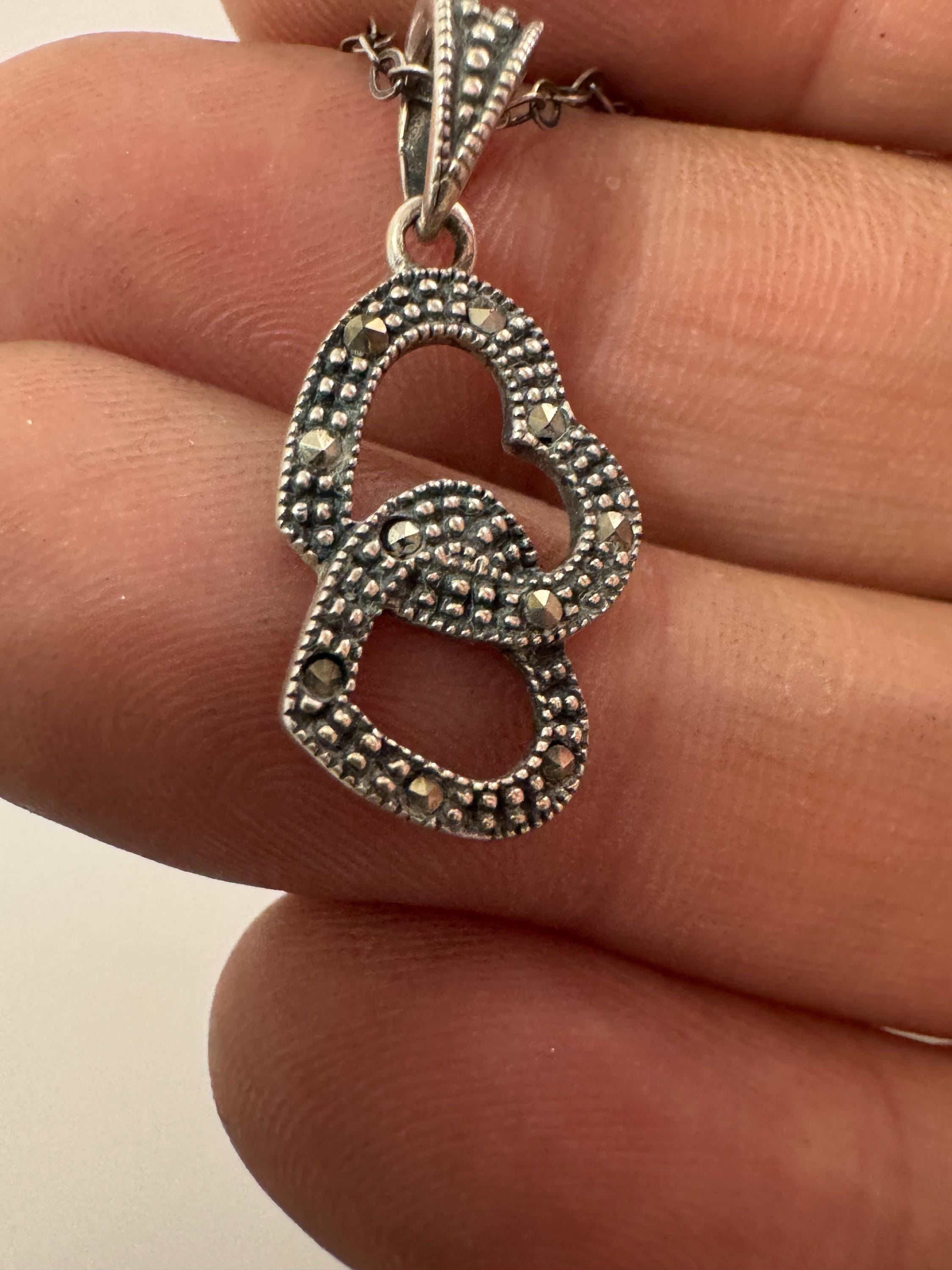 sterling silver and marcasite double love heart shaped pendant 3cm 3.6 grams on a 46cm 925 chain
