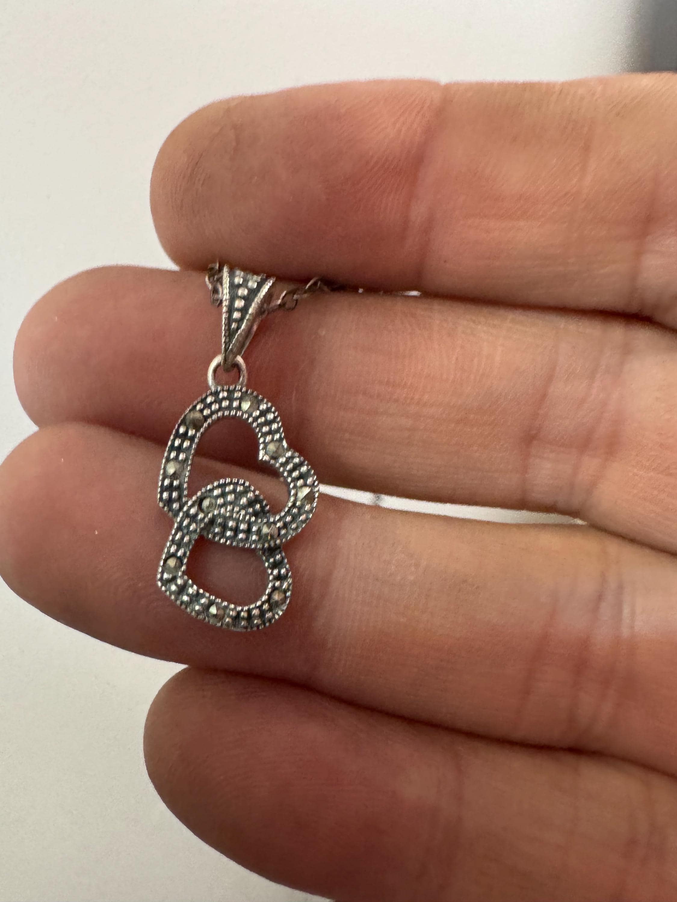 sterling silver and marcasite double love heart shaped pendant 3cm 3.6 grams on a 46cm 925 chain