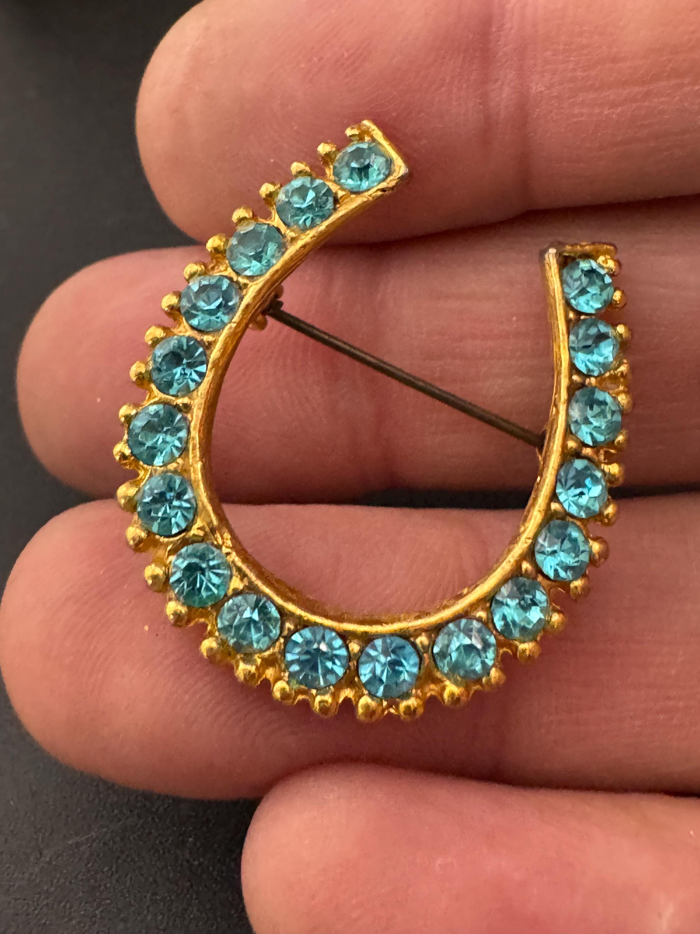 Vintage blue crystal lucky horseshoe rhinestone brooch