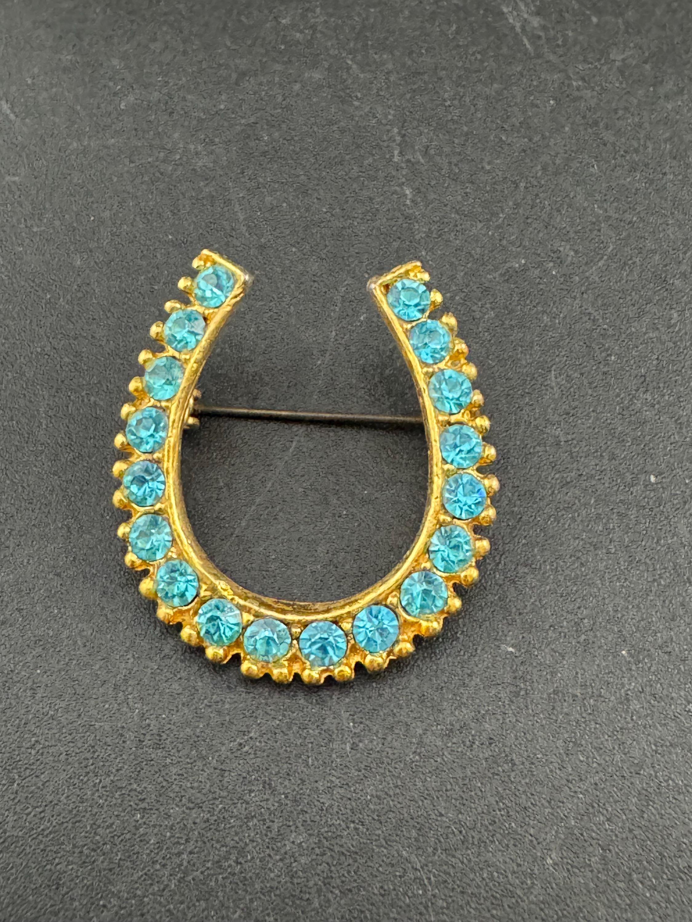 Vintage blue crystal lucky horseshoe rhinestone brooch