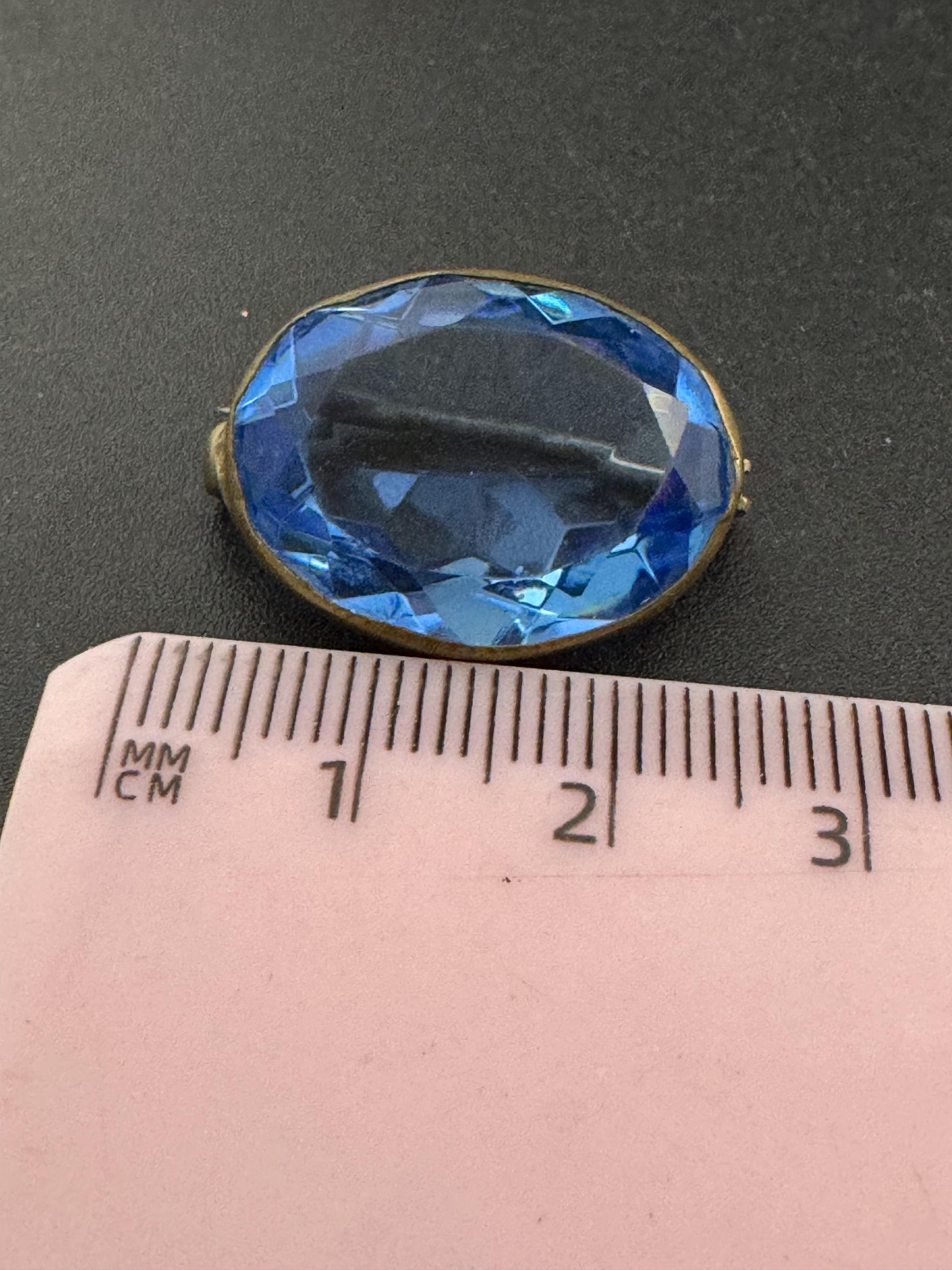 Antique Edwardian sapphire blue oval faceted glass brooch, c clasp