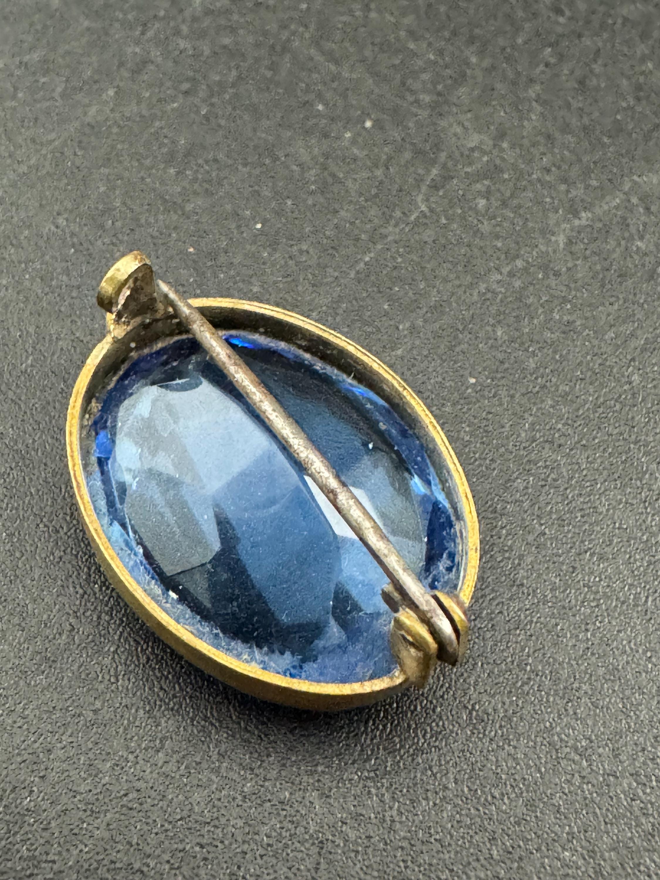 Antique Edwardian sapphire blue oval faceted glass brooch, c clasp
