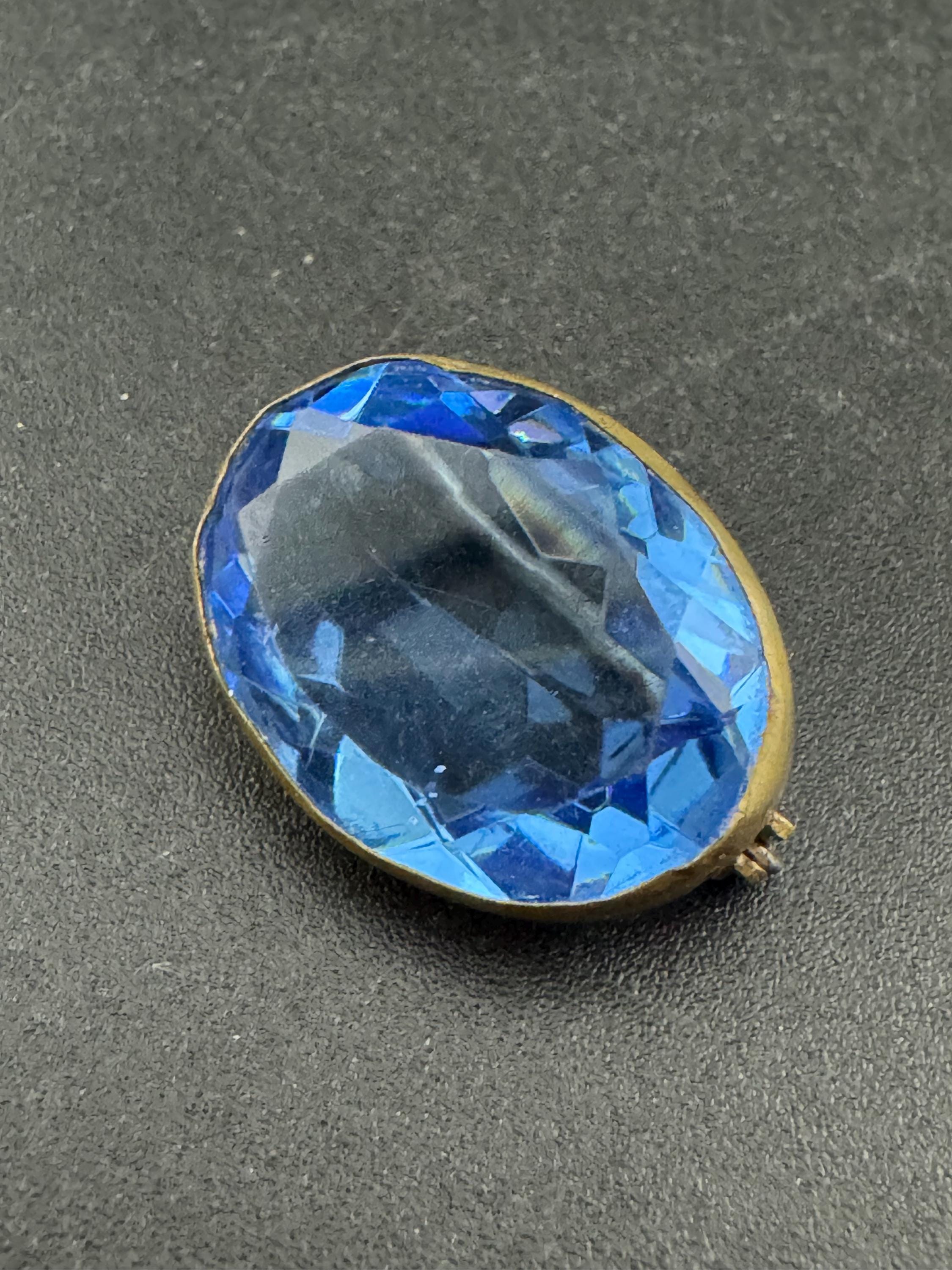 Antique Edwardian sapphire blue oval faceted glass brooch, c clasp
