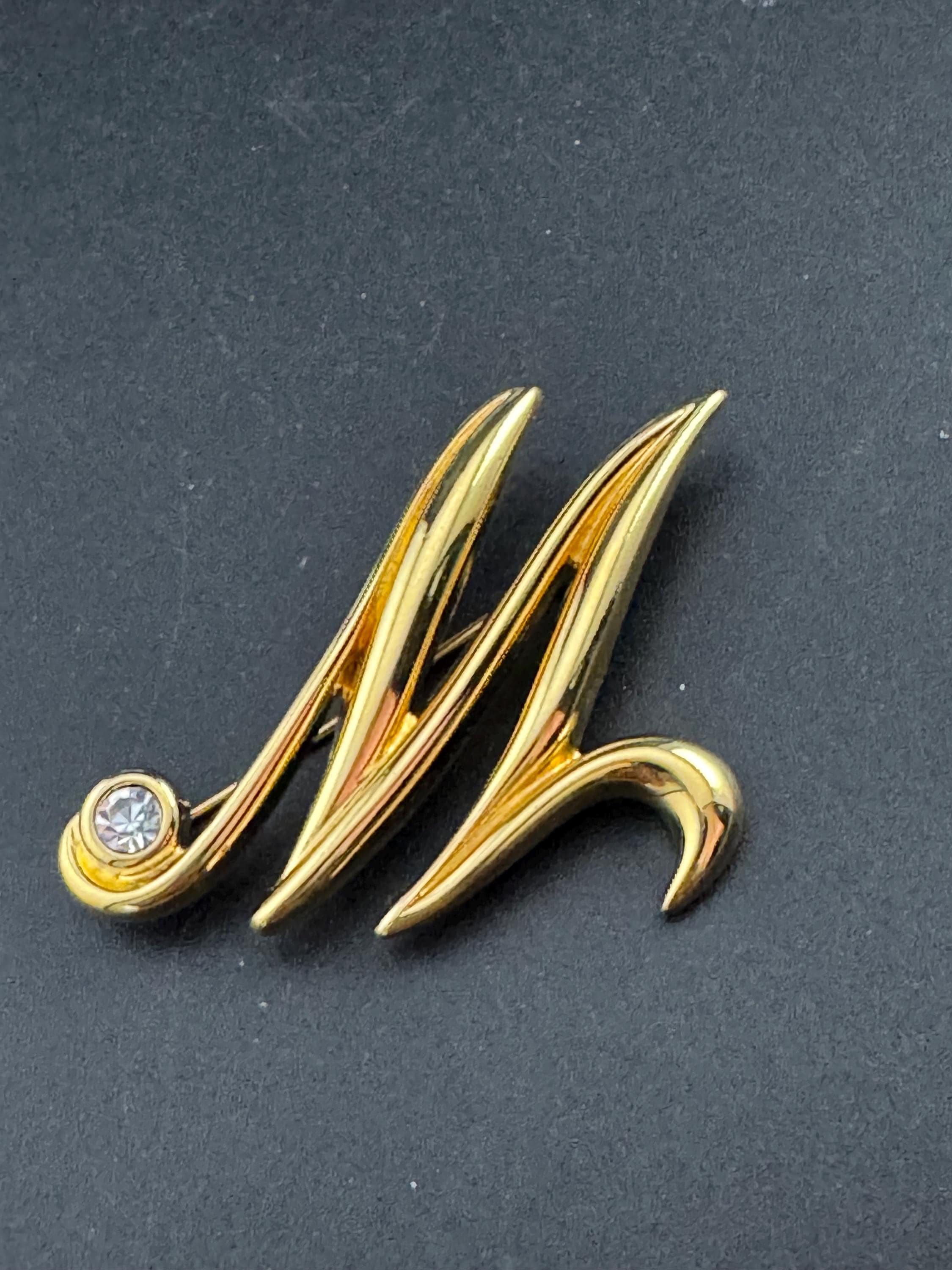 Signed MONET letter M monogram name brooch, gold tone 5cm