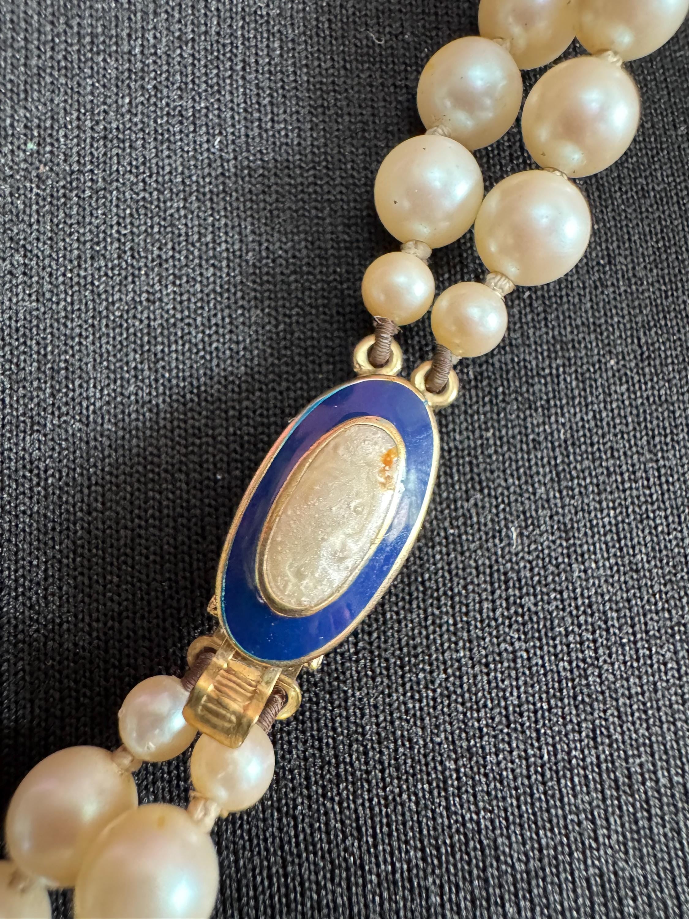 Cream Knotted Glass Pearl Necklace: Gold Plated Enamel Clasp