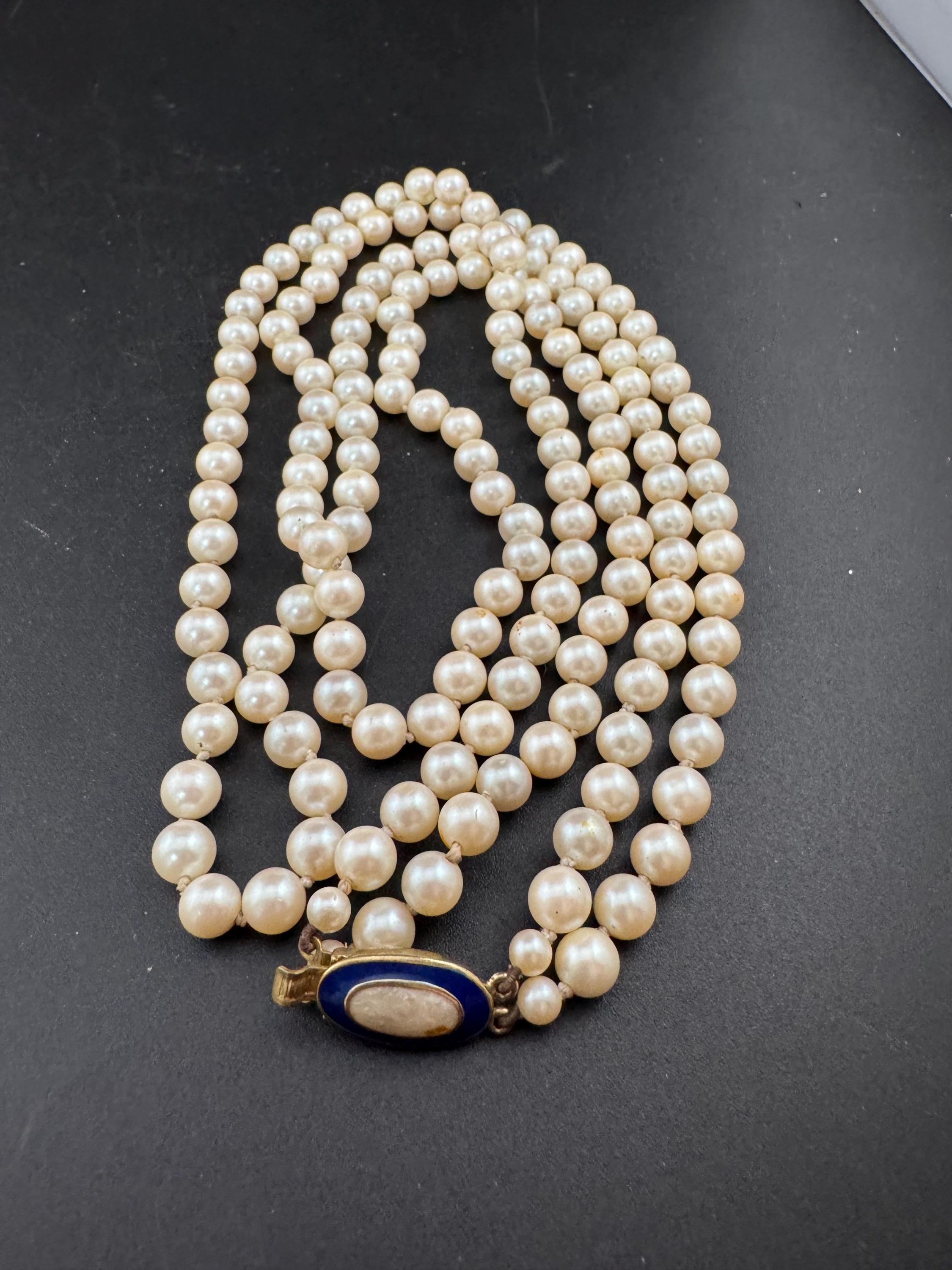Cream Knotted Glass Pearl Necklace: Gold Plated Enamel Clasp