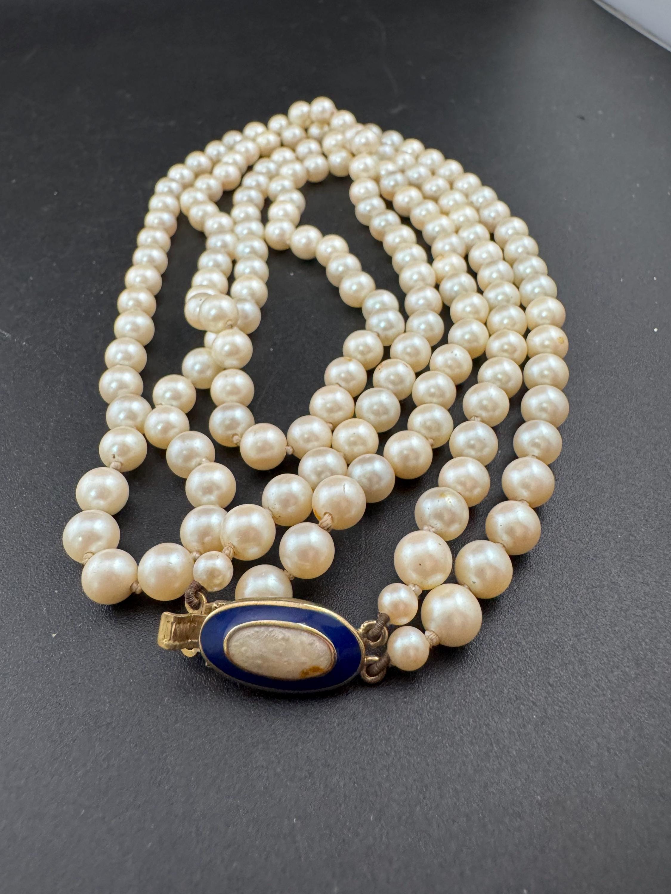 Beautiful 2 row 61cm long Cream knotted glass pearl necklace with gold plated blue enamel clasp