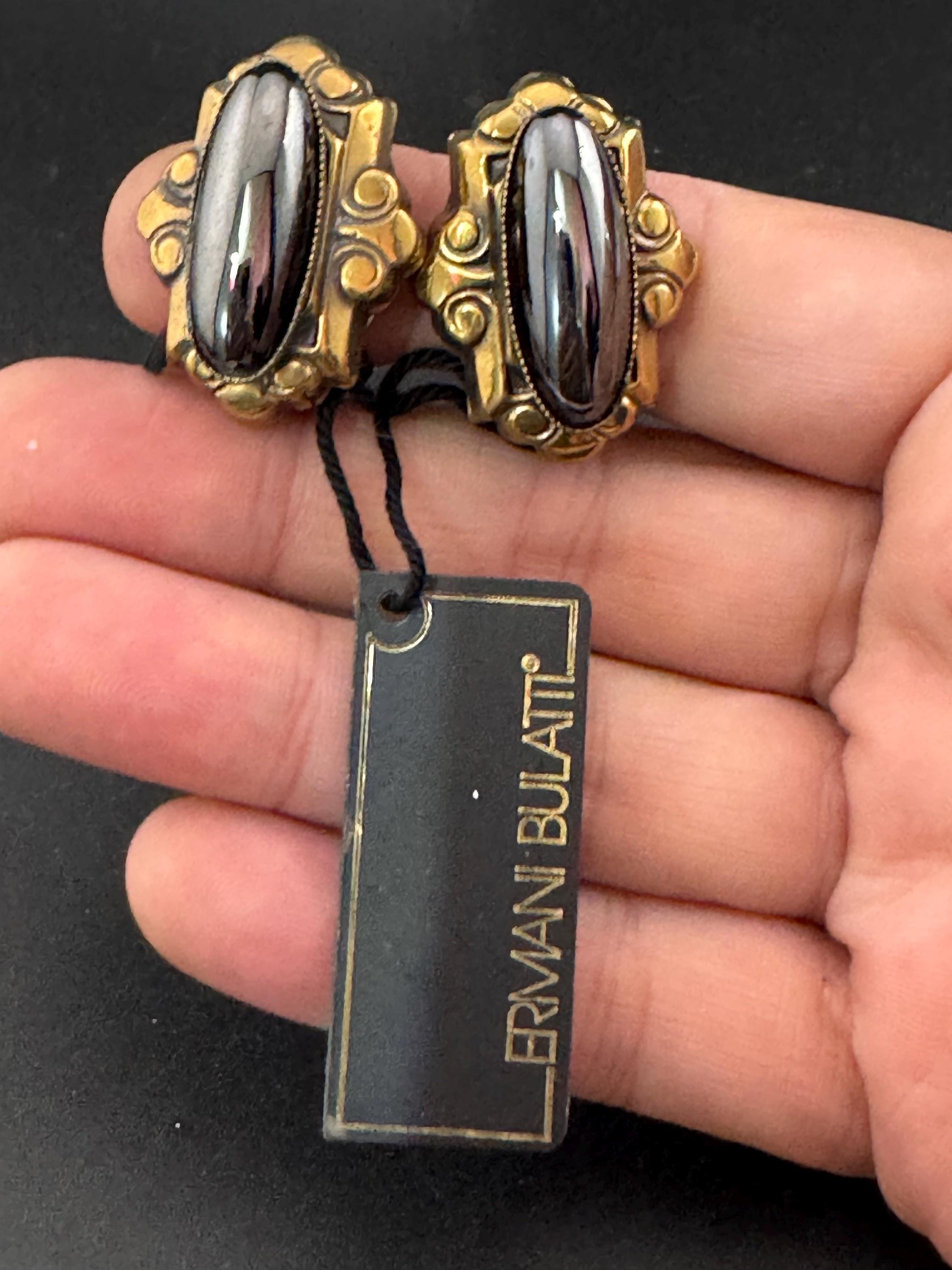 Designer Ermani Bulatti grey glass oval clip on earrings, antique gold tone signed