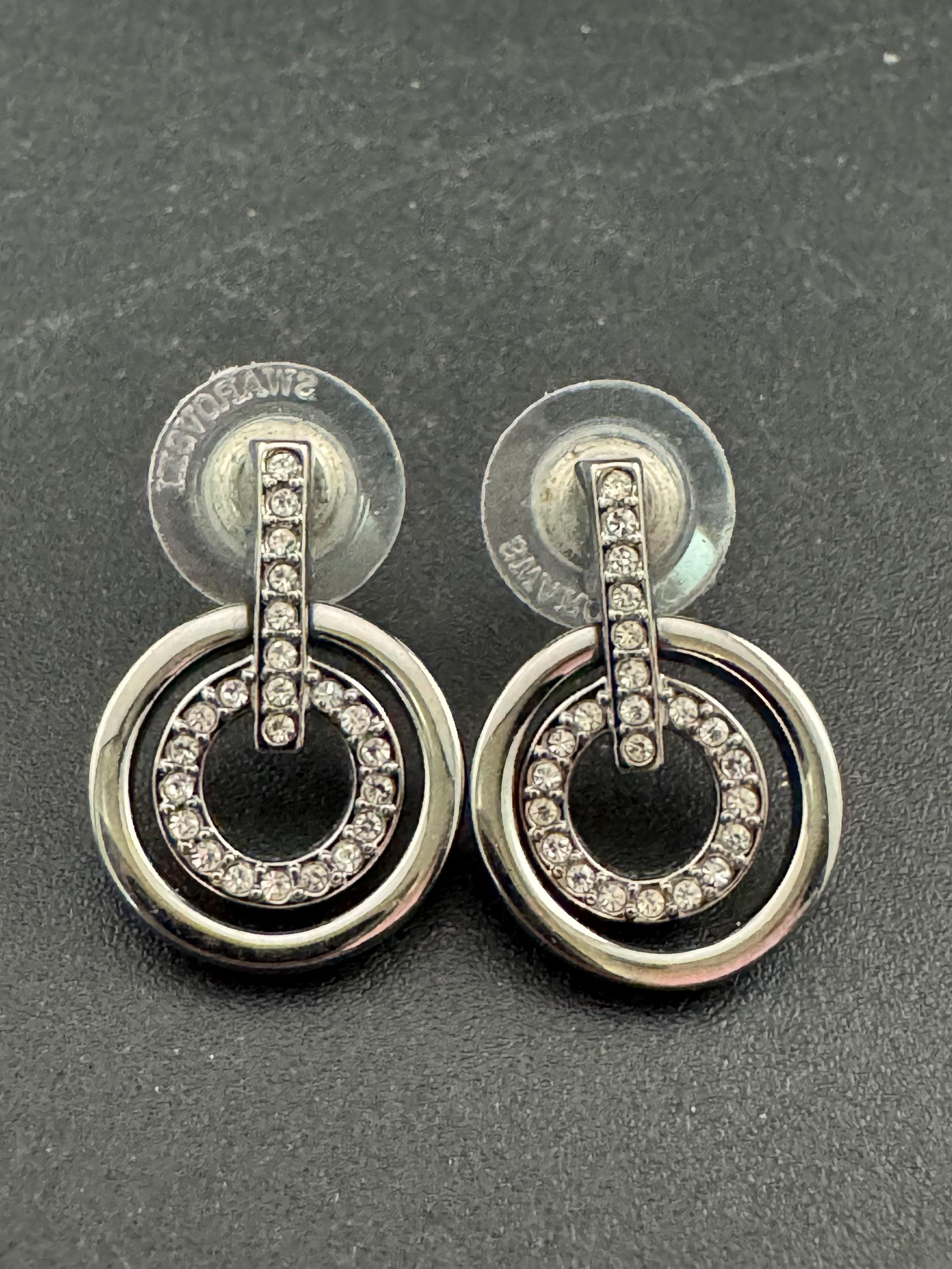Signed Swarovski silver tone geometric clear crystal pierced drop earrings
