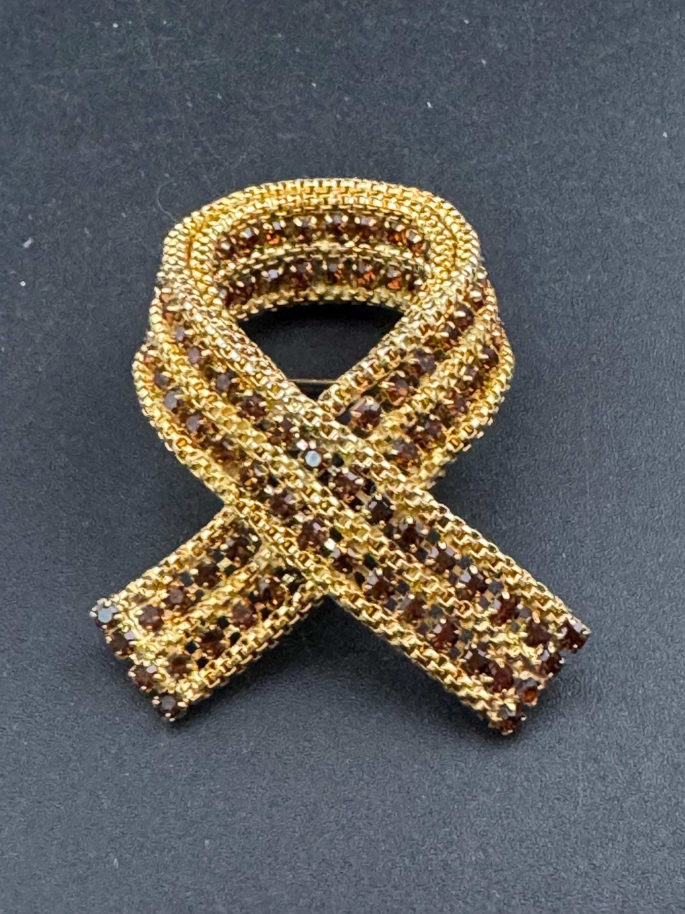 vintage gold tone mesh brown cognac glass rhinestone cross knot brooch 1960s