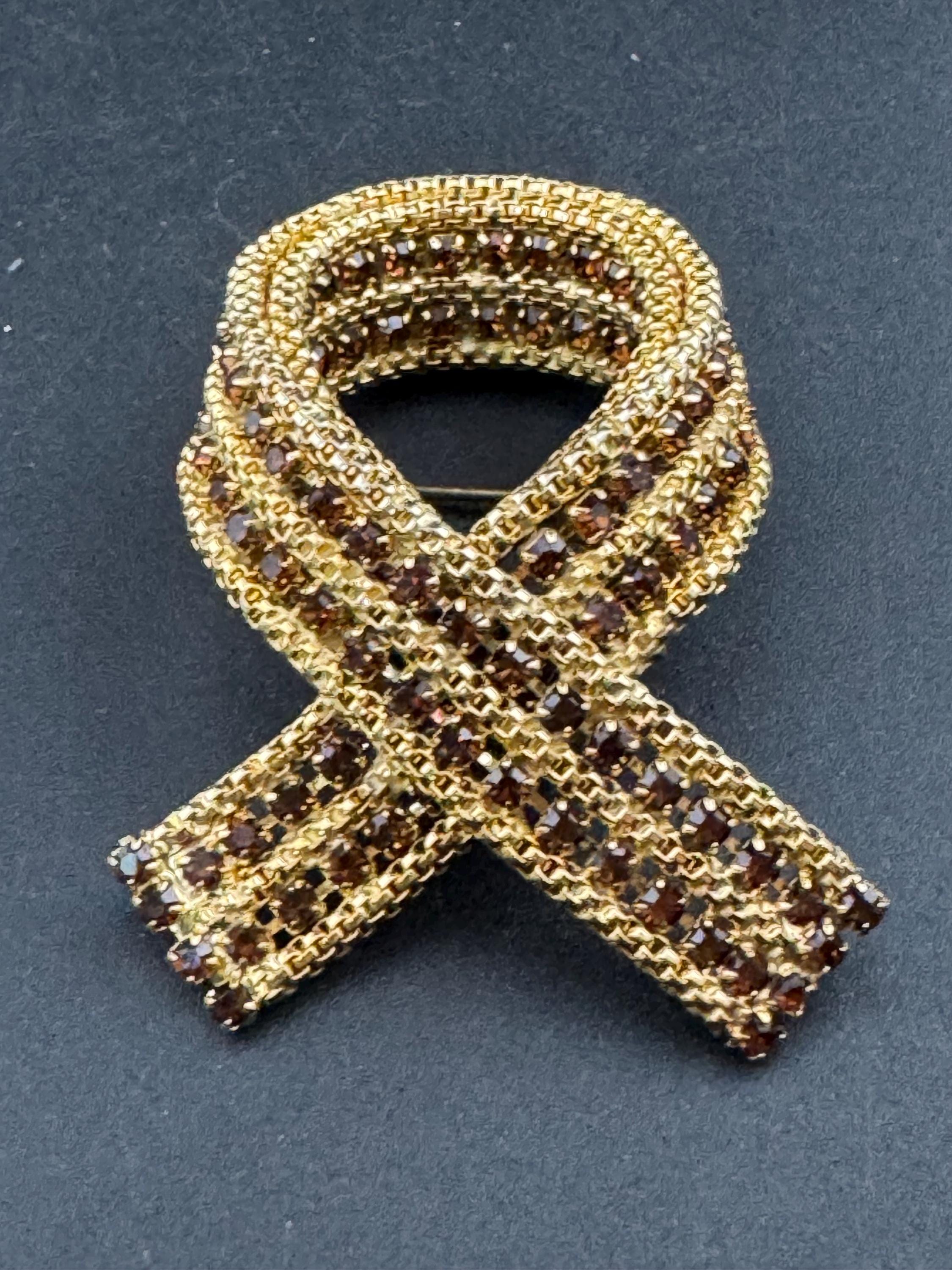 vintage gold tone mesh brown cognac glass rhinestone cross knot brooch 1960s