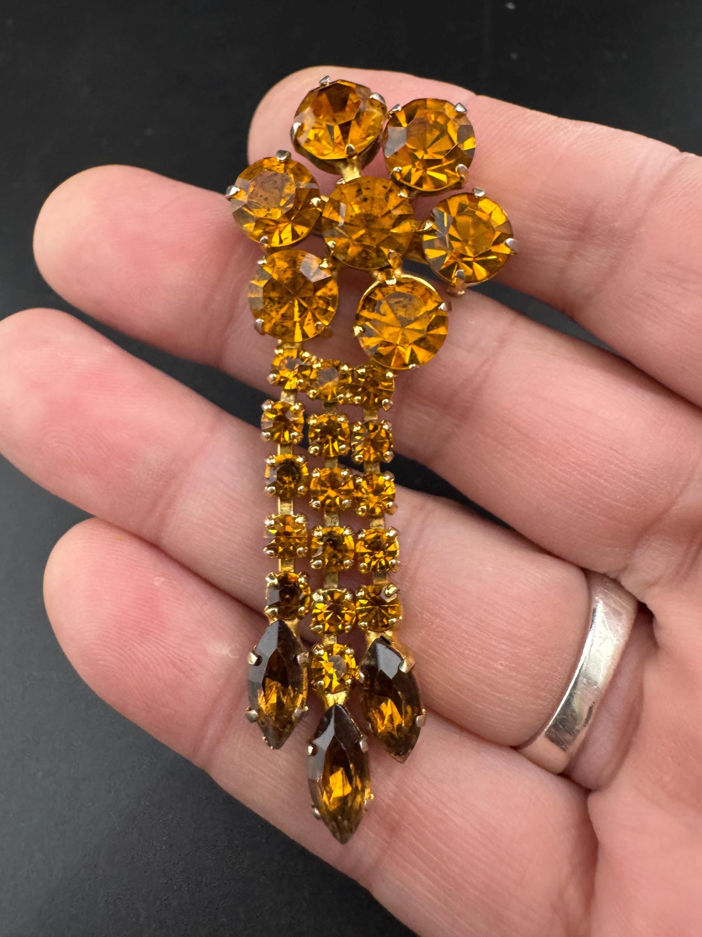 vintage gold tone waterfall brooch with large diamanté brown cognac glass stones