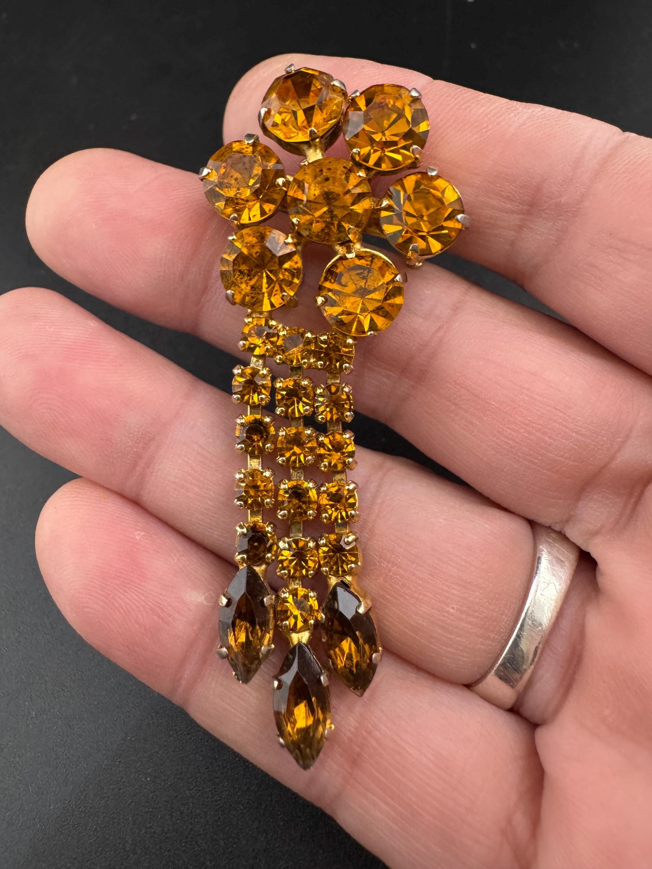 vintage gold tone waterfall brooch with large diamanté brown cognac glass stones