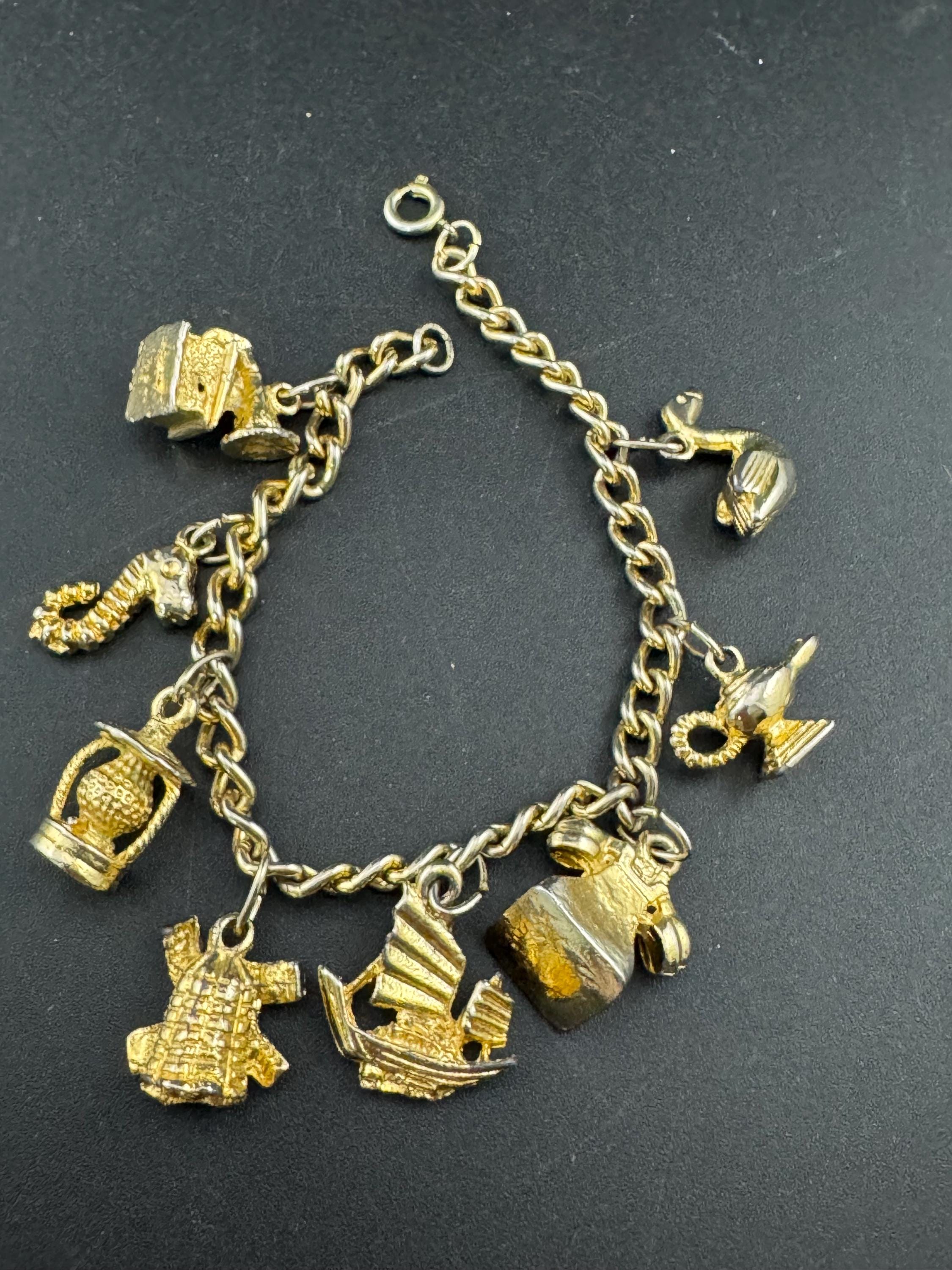 Vintage retro Gold tone chain link charm bracelet windmill seahorse lamp boat lantern telephone  19cm long