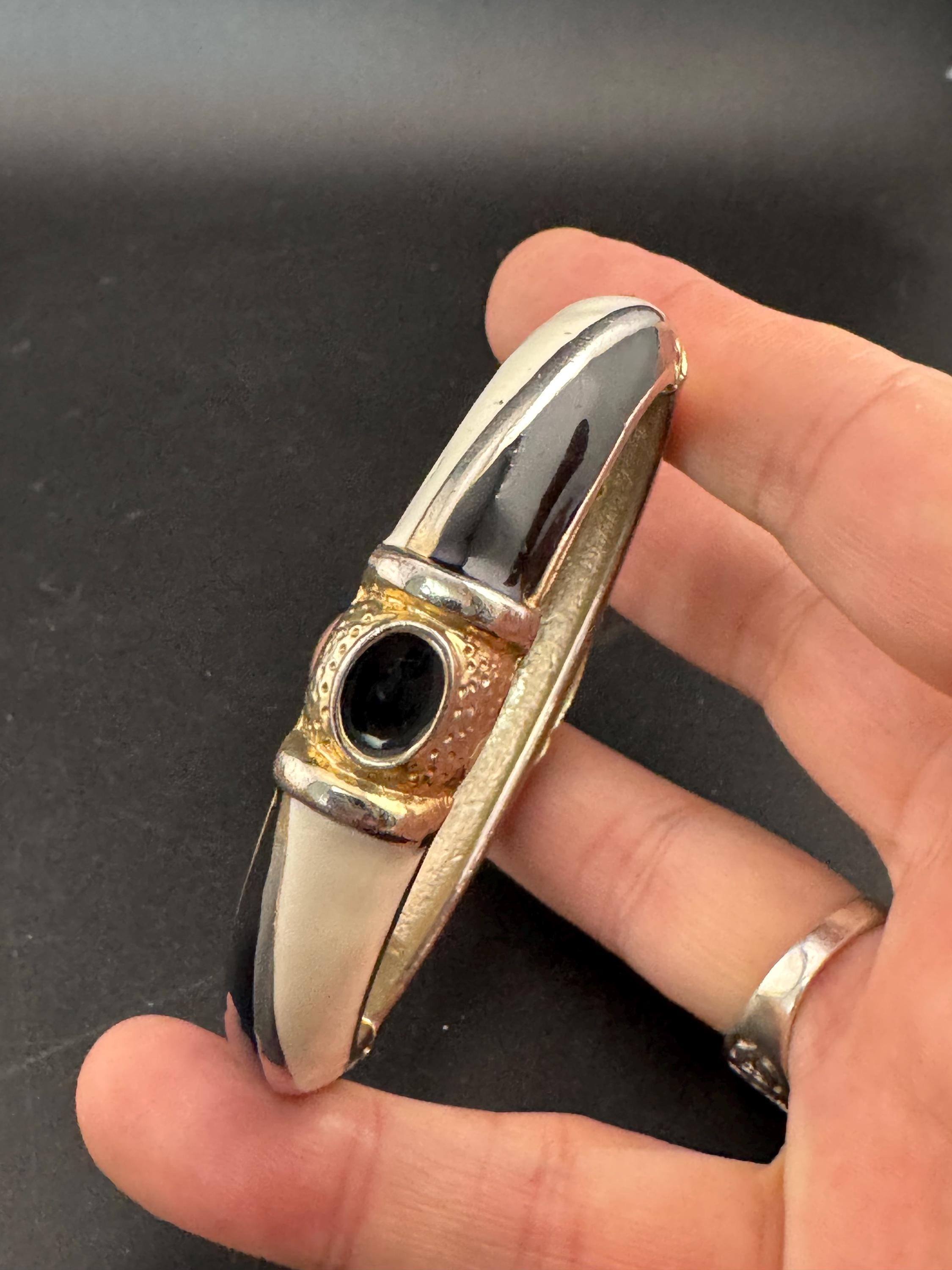 Vintage cream and black enamel hinged clamper bangle , 80s