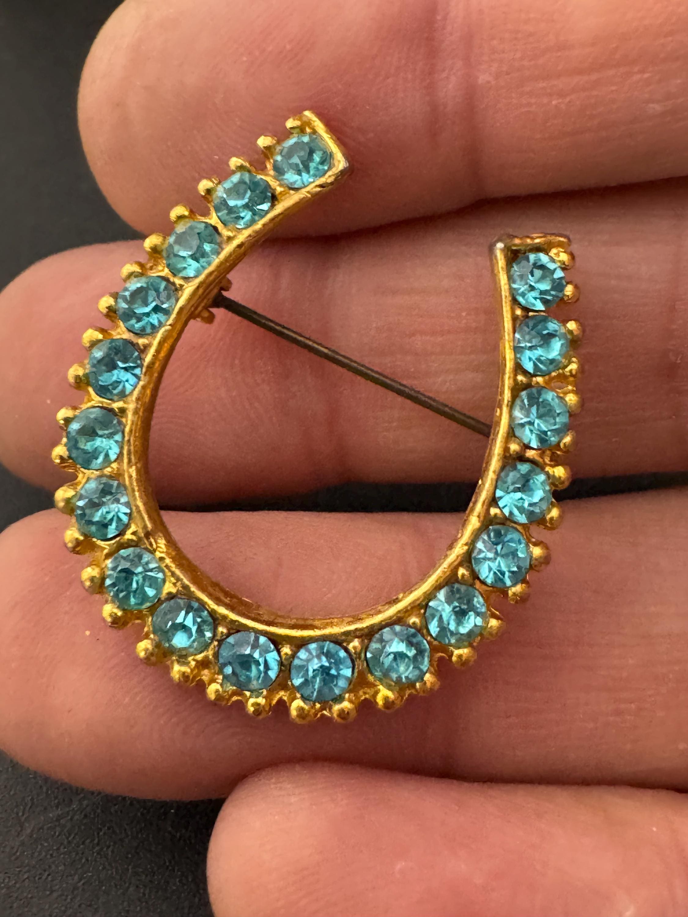Vintage blue crystal lucky horseshoe rhinestone brooch