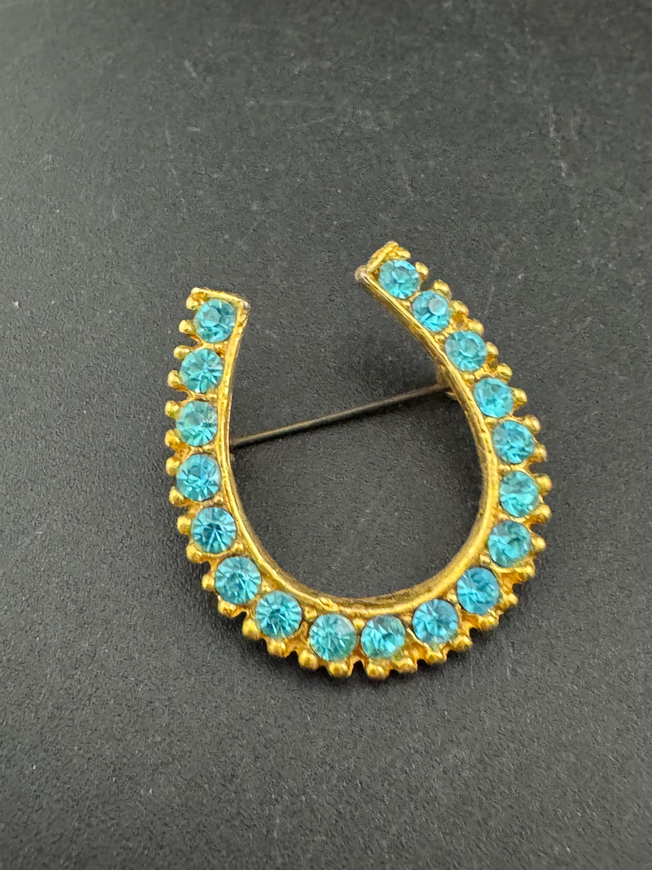 Vintage blue crystal lucky horseshoe rhinestone brooch