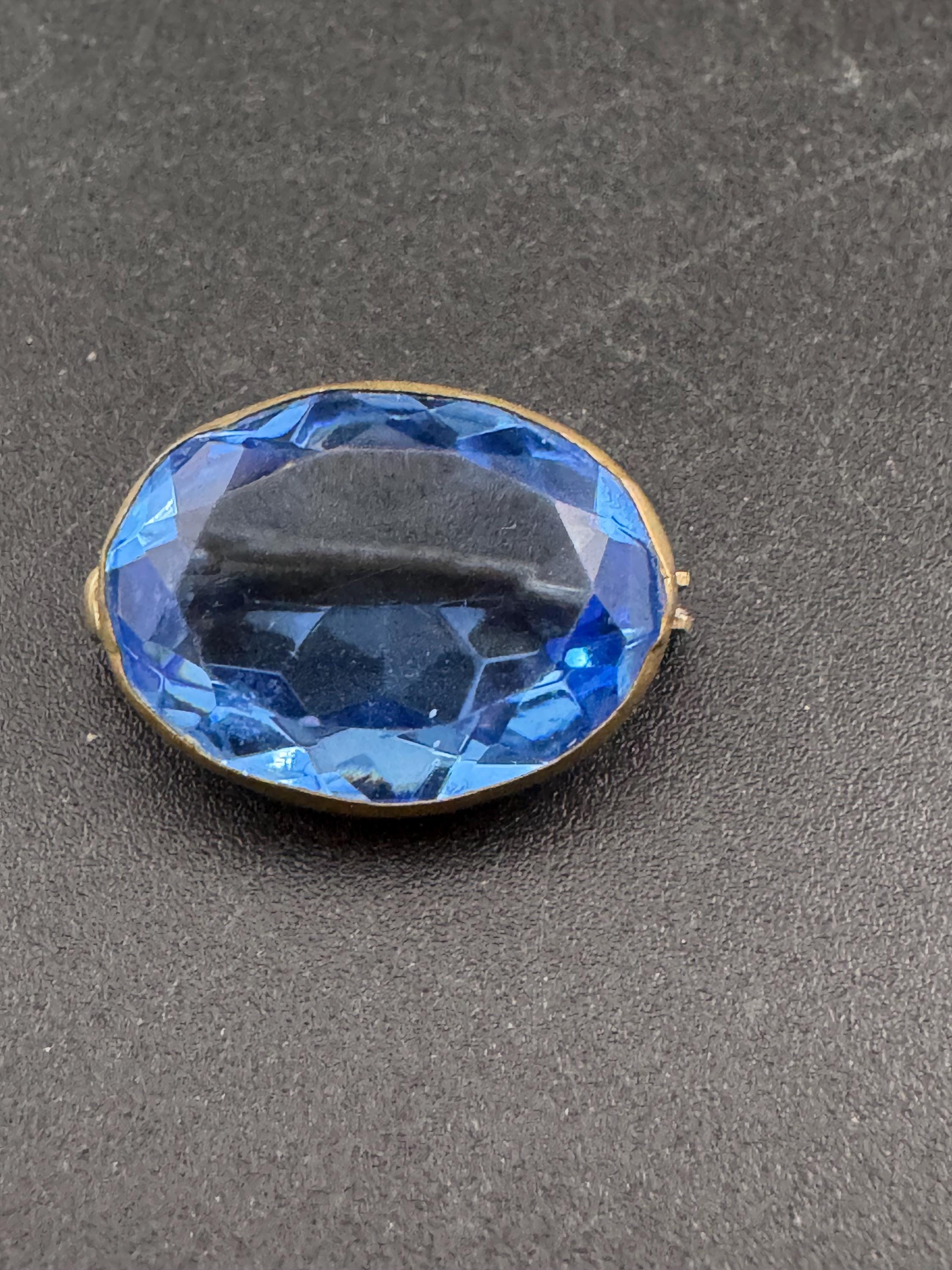 Antique Edwardian sapphire blue oval faceted glass brooch, c clasp