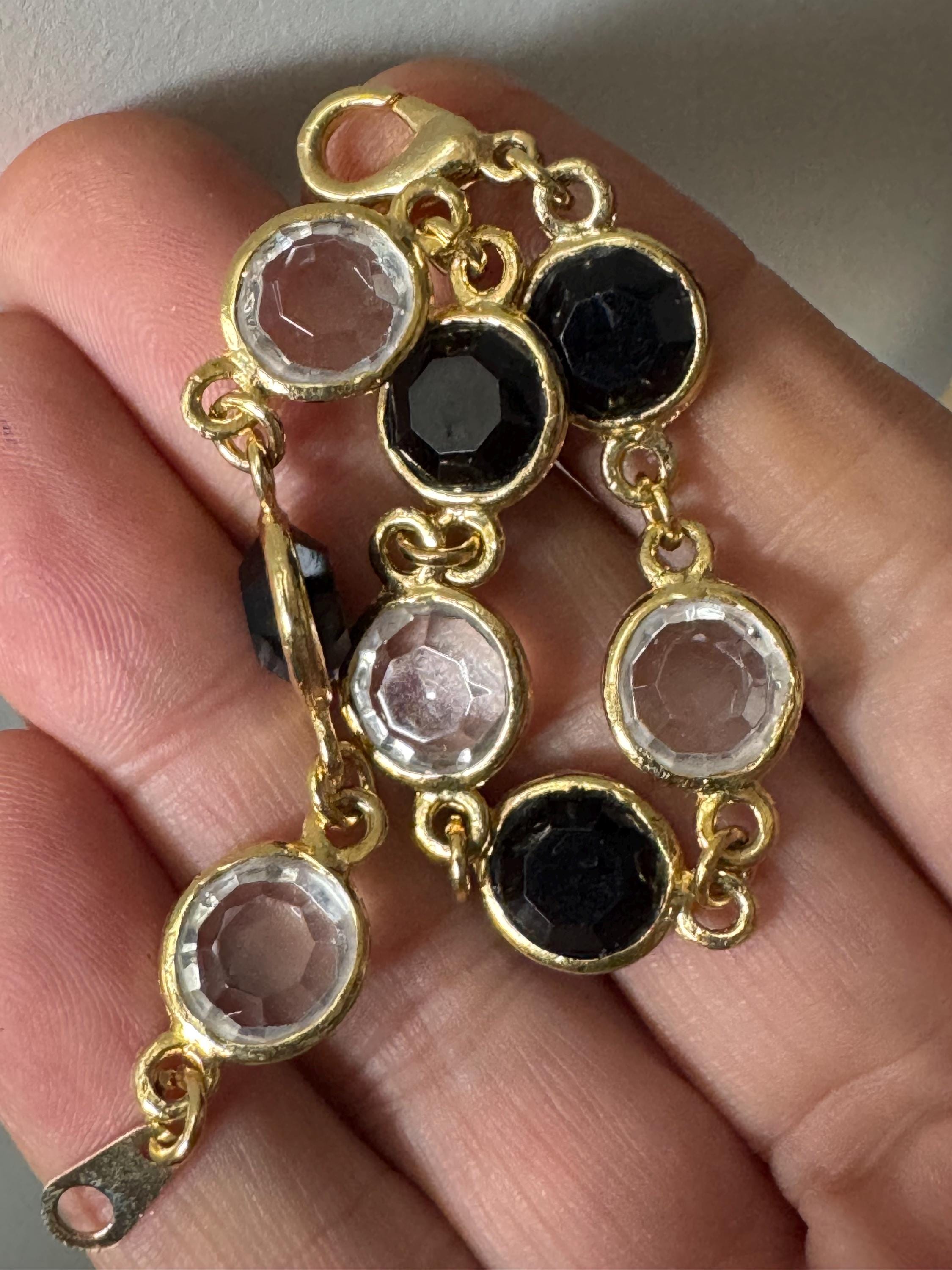 Vintage black and clear round bezel set gold tone open backed rivière bracelet 18.5cm