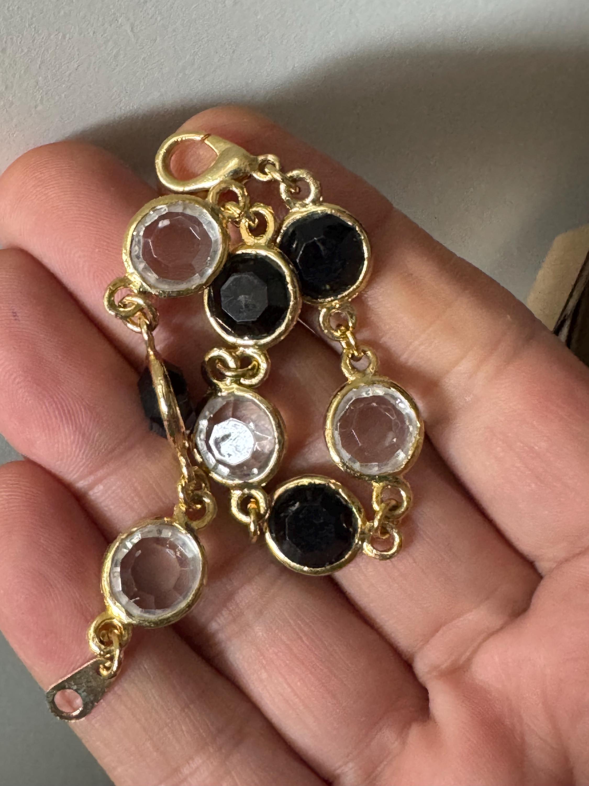 Vintage black and clear round bezel set gold tone open backed rivière bracelet 18.5cm