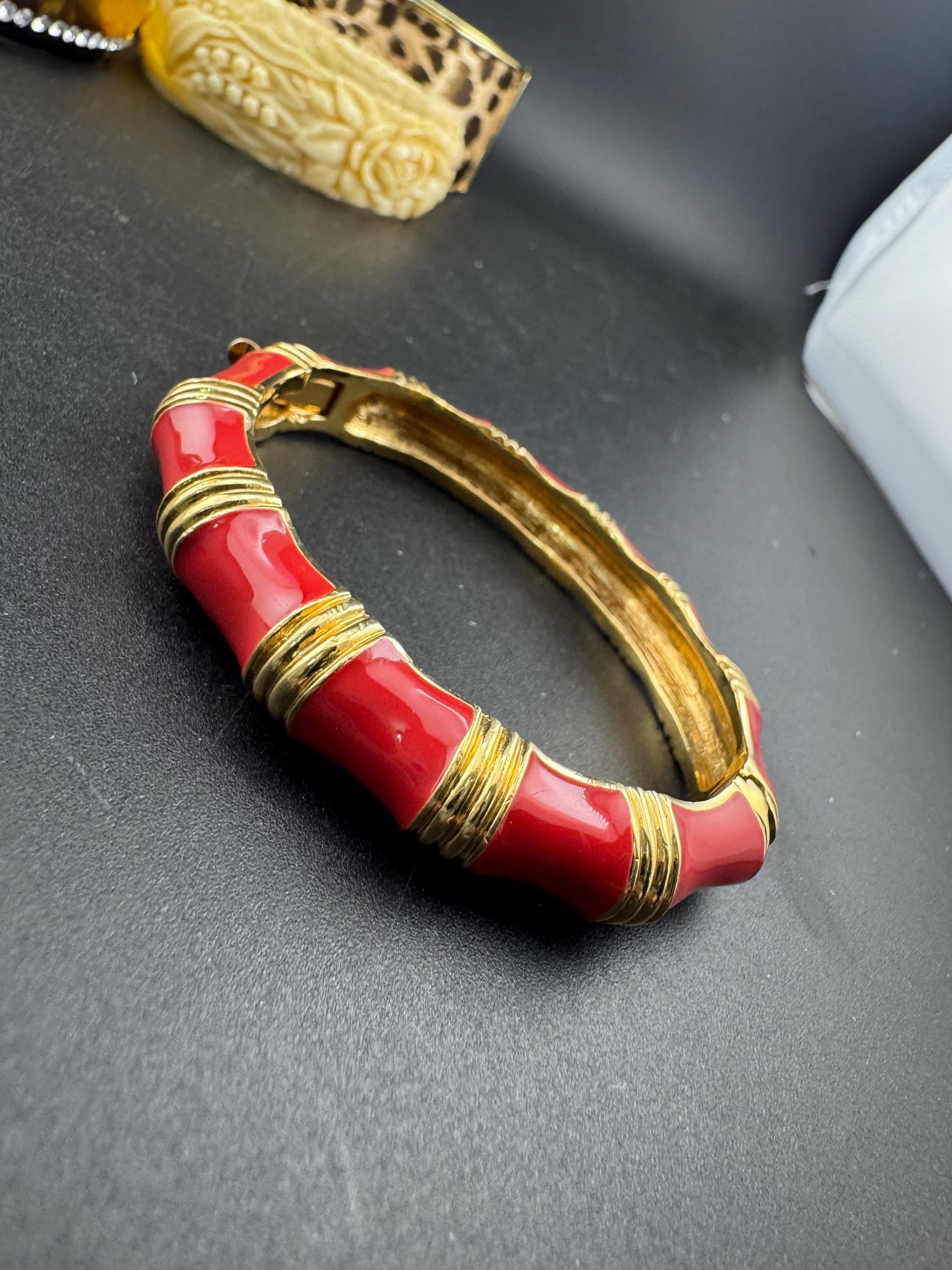 Signed KJL Red enamel gold tone bamboo clamper bangle bracelet Kenneth j lane