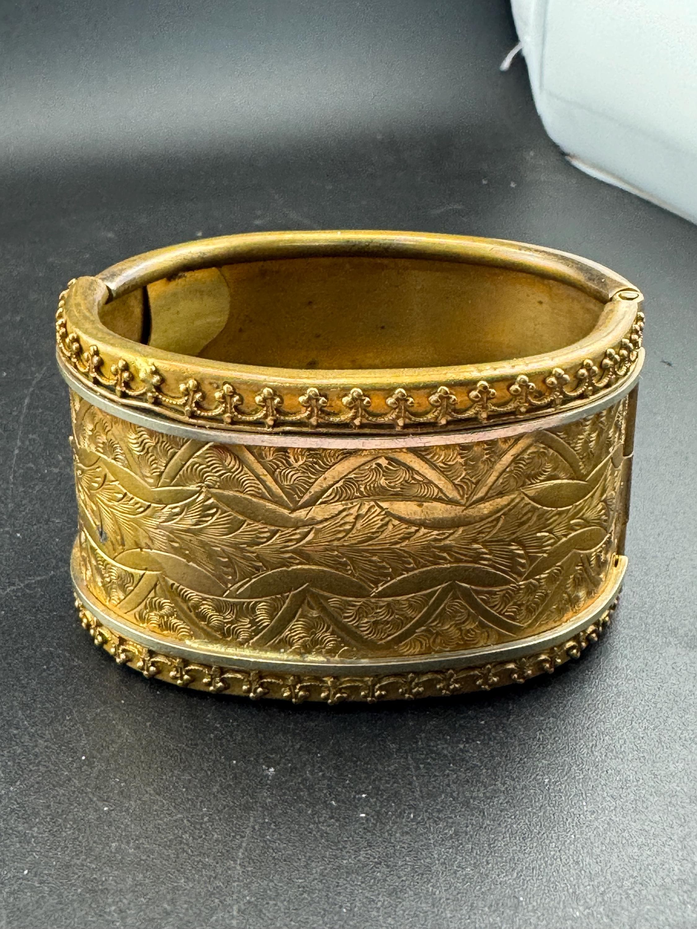 Antique Victorian engraved wide brass bangle bracelet:  hinged gold tone