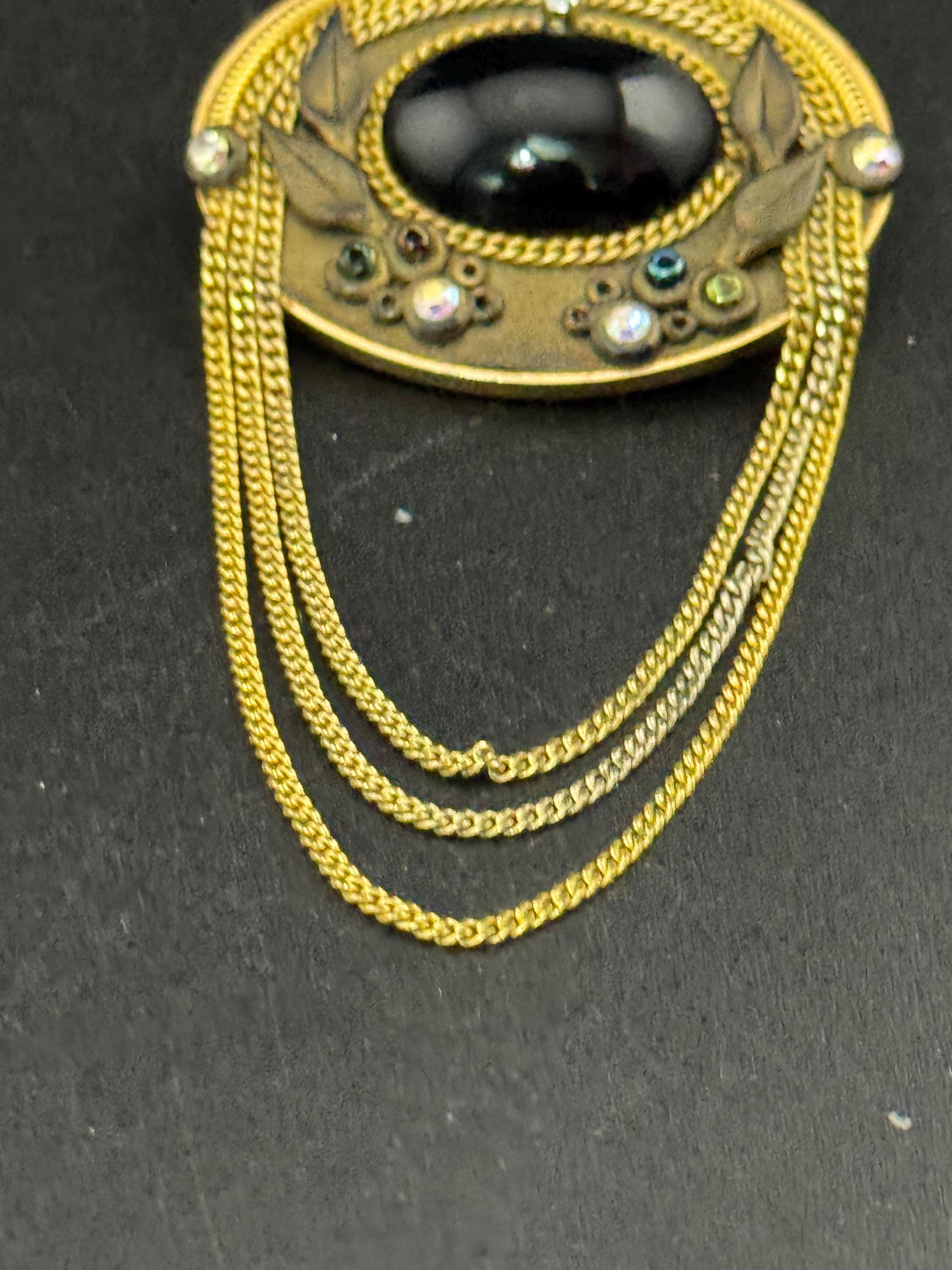 signed Marena west Germany cabochon brooch, set with rhinestones and chains 18k gold plated
