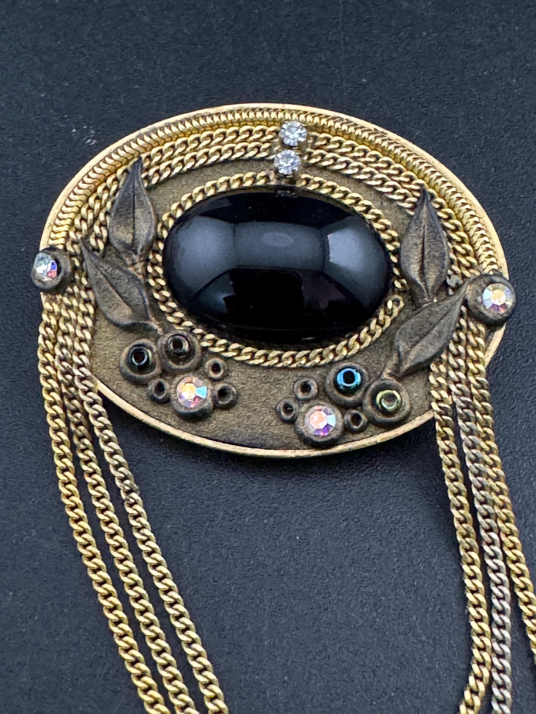 signed Marena west Germany cabochon brooch, set with rhinestones and chains 18k gold plated