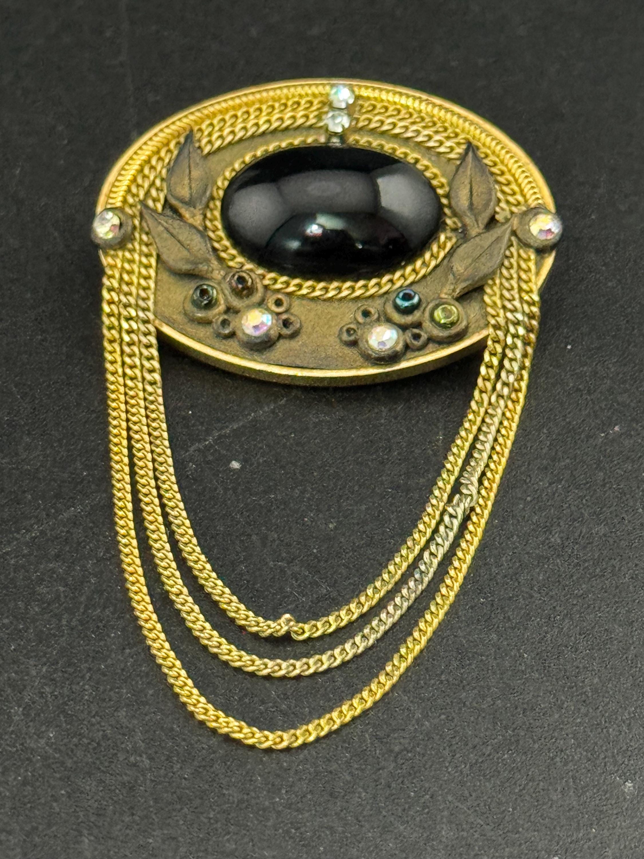 signed Marena west Germany cabochon brooch, set with rhinestones and chains 18k gold plated