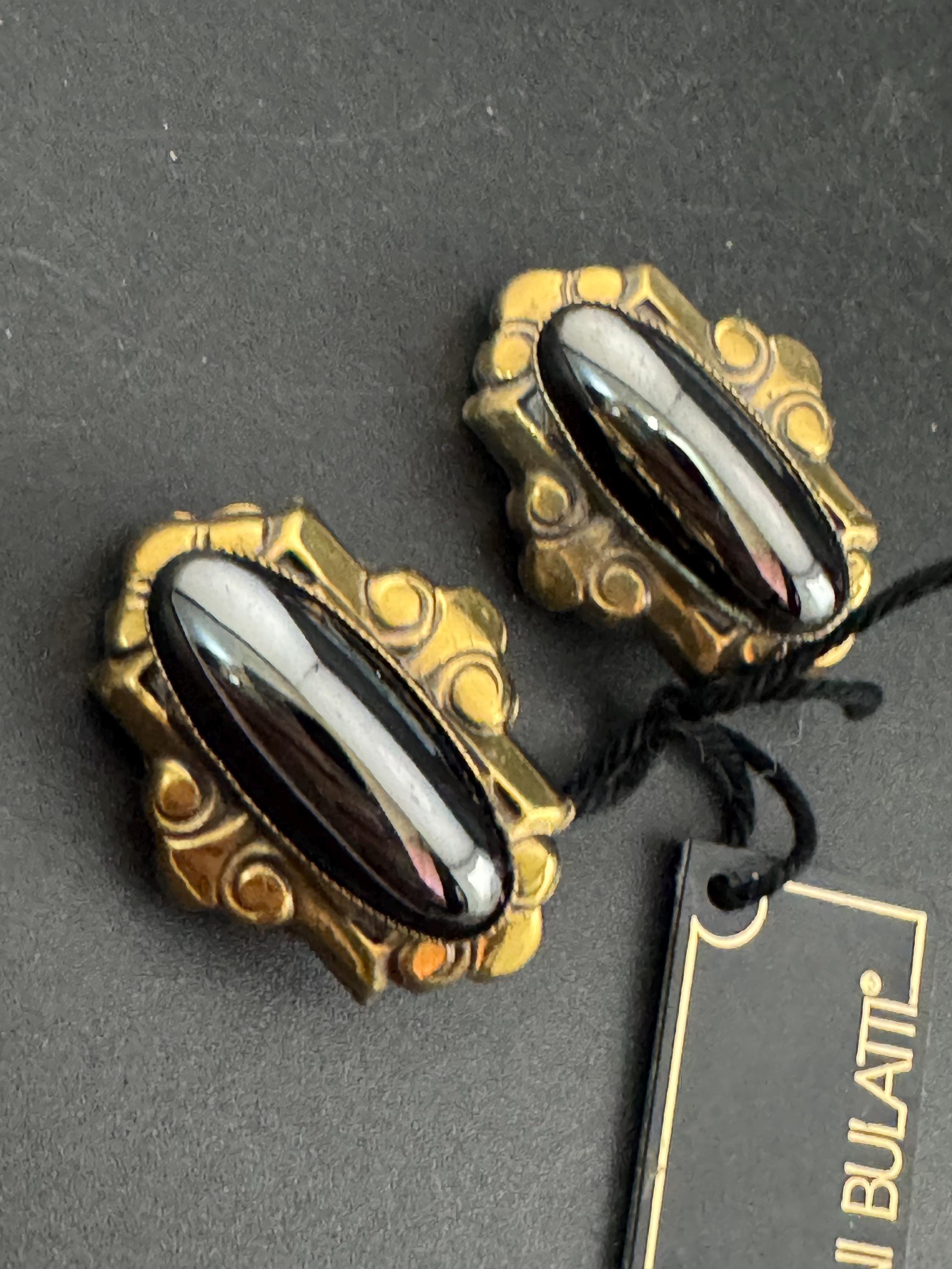 Designer Ermani Bulatti grey glass oval clip on earrings, antique gold tone signed