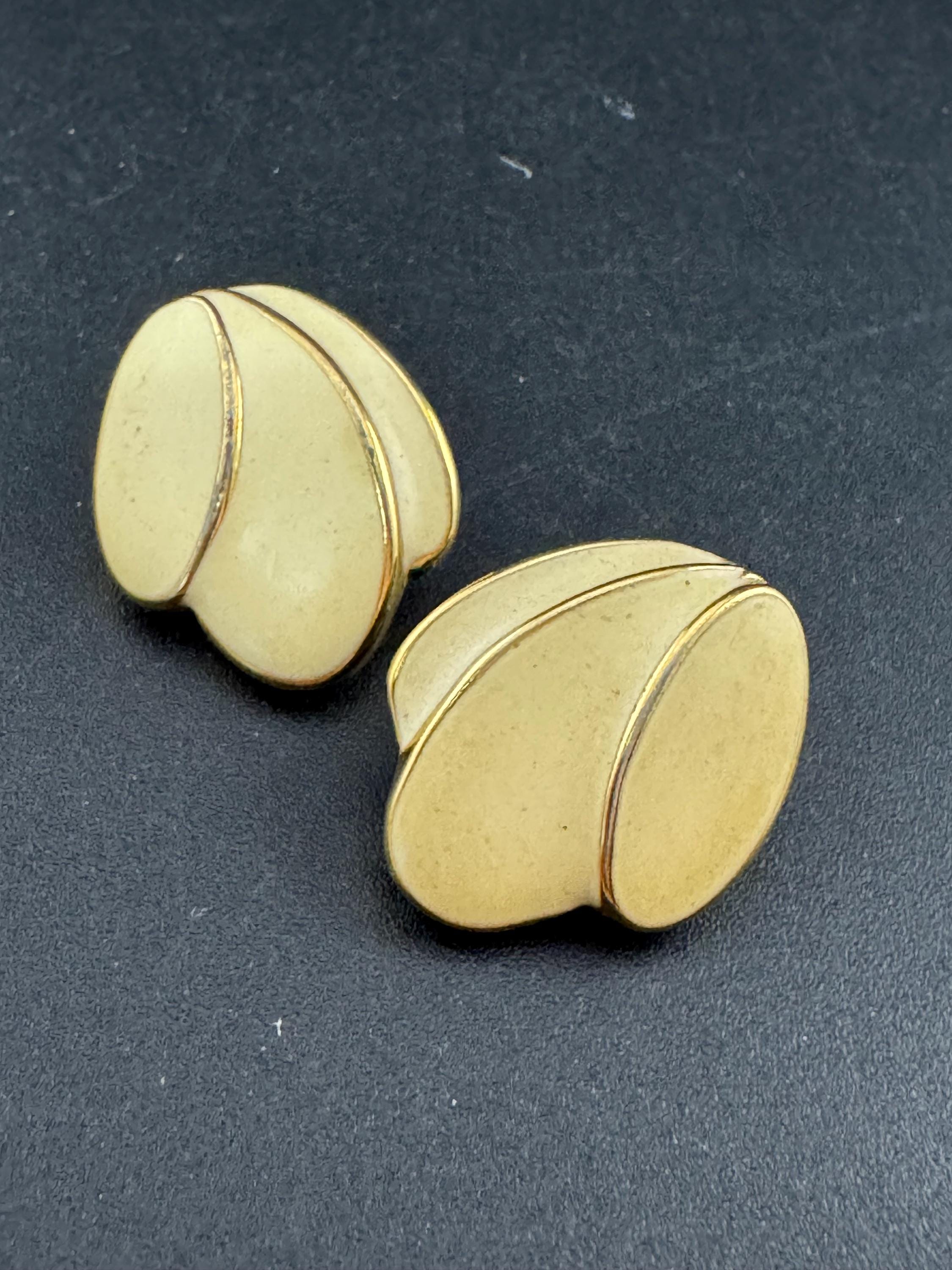 Signed Napier cream enamel pair stud earrings, gold tone pierced