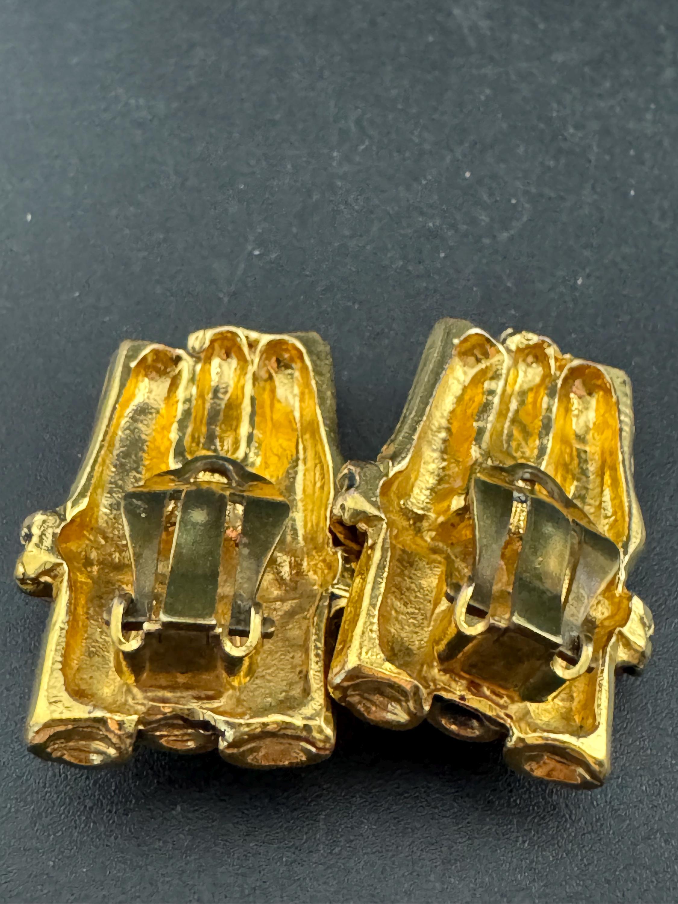 Signed Sidney carron rope twist clip on earrings, designer gold tone