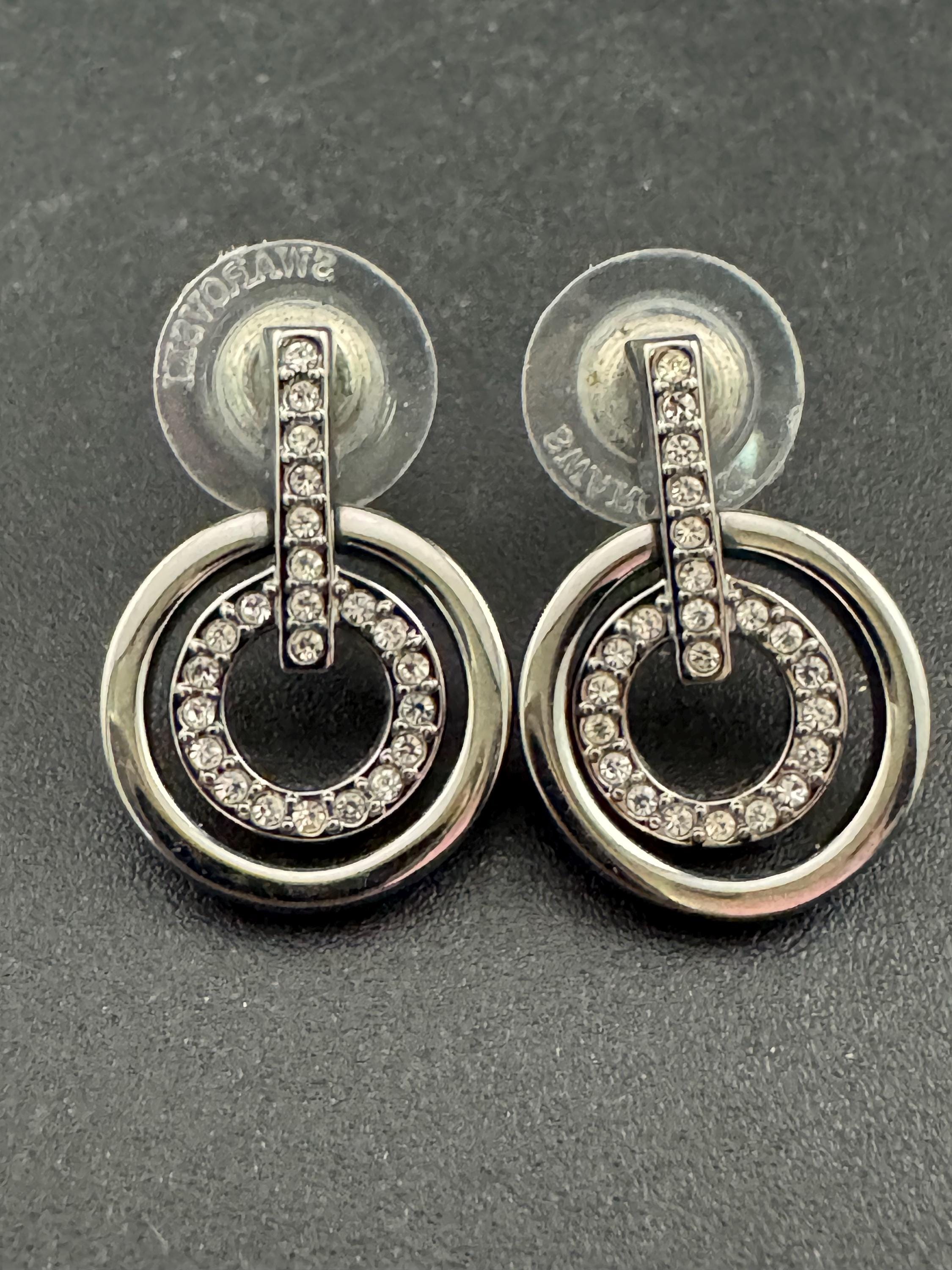 Signed Swarovski silver tone geometric clear crystal pierced drop earrings