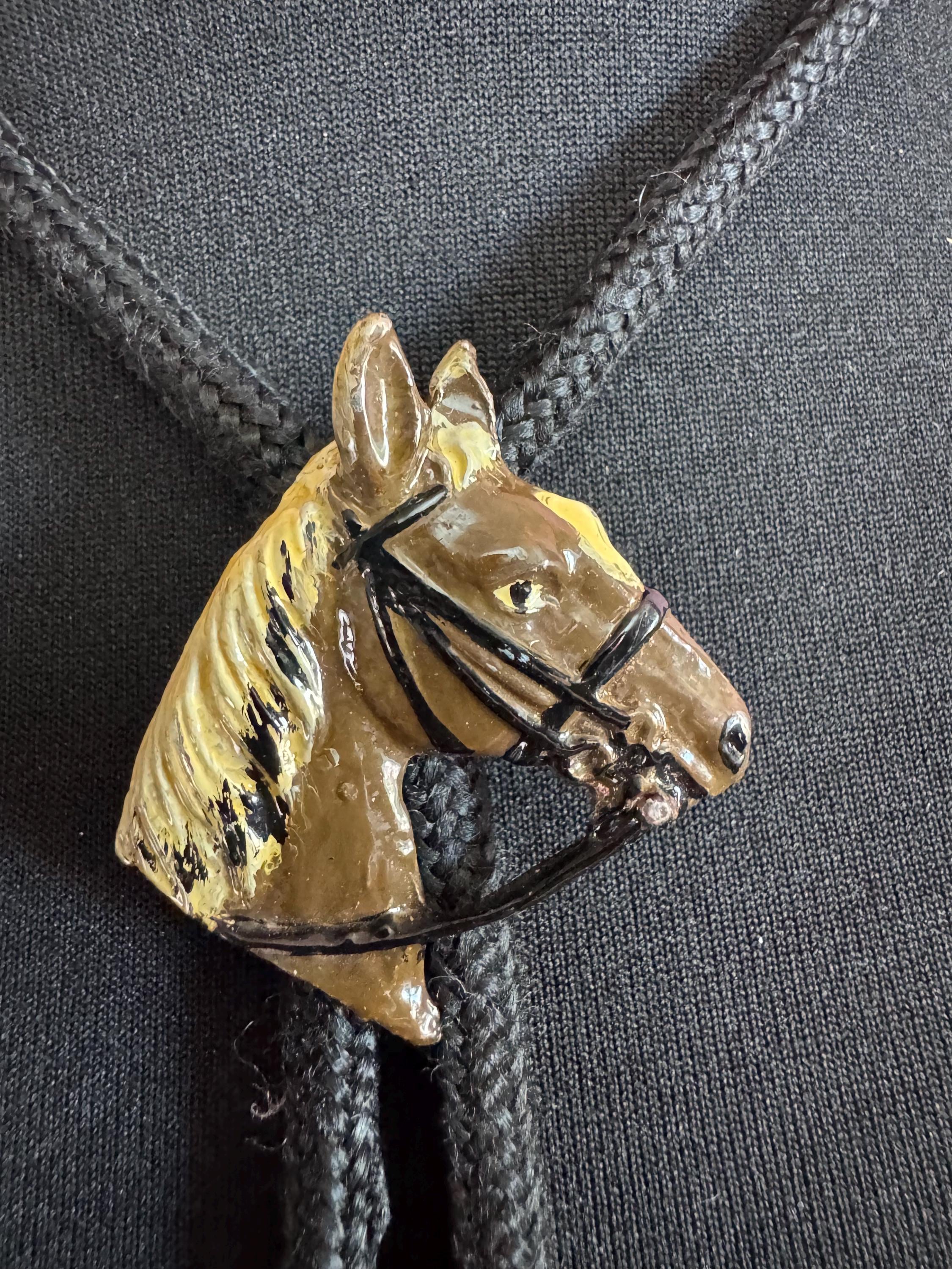 Retro western style brown enamel horse bolo tie with black woven cord