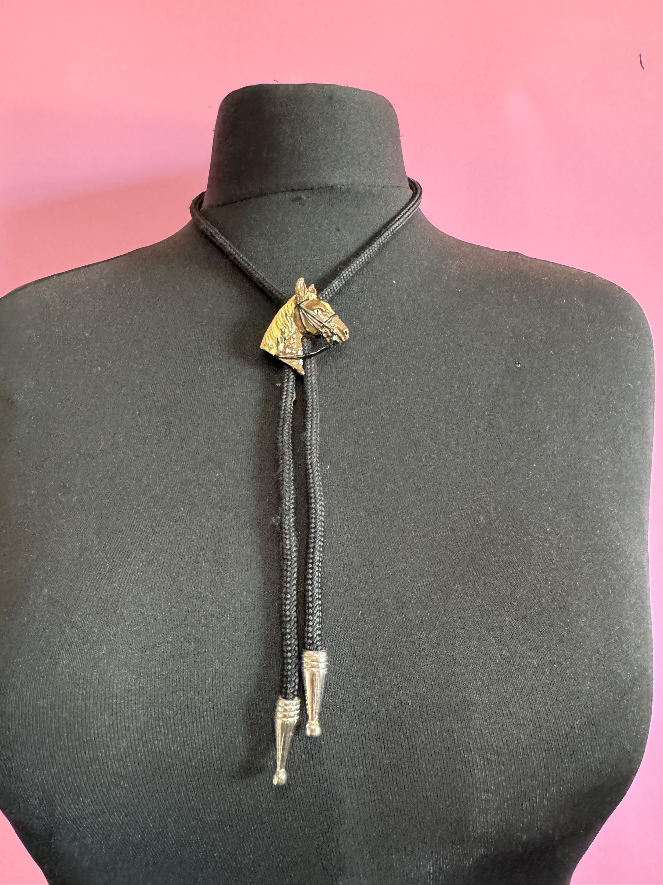 Retro western style brown enamel horse bolo tie with black woven cord