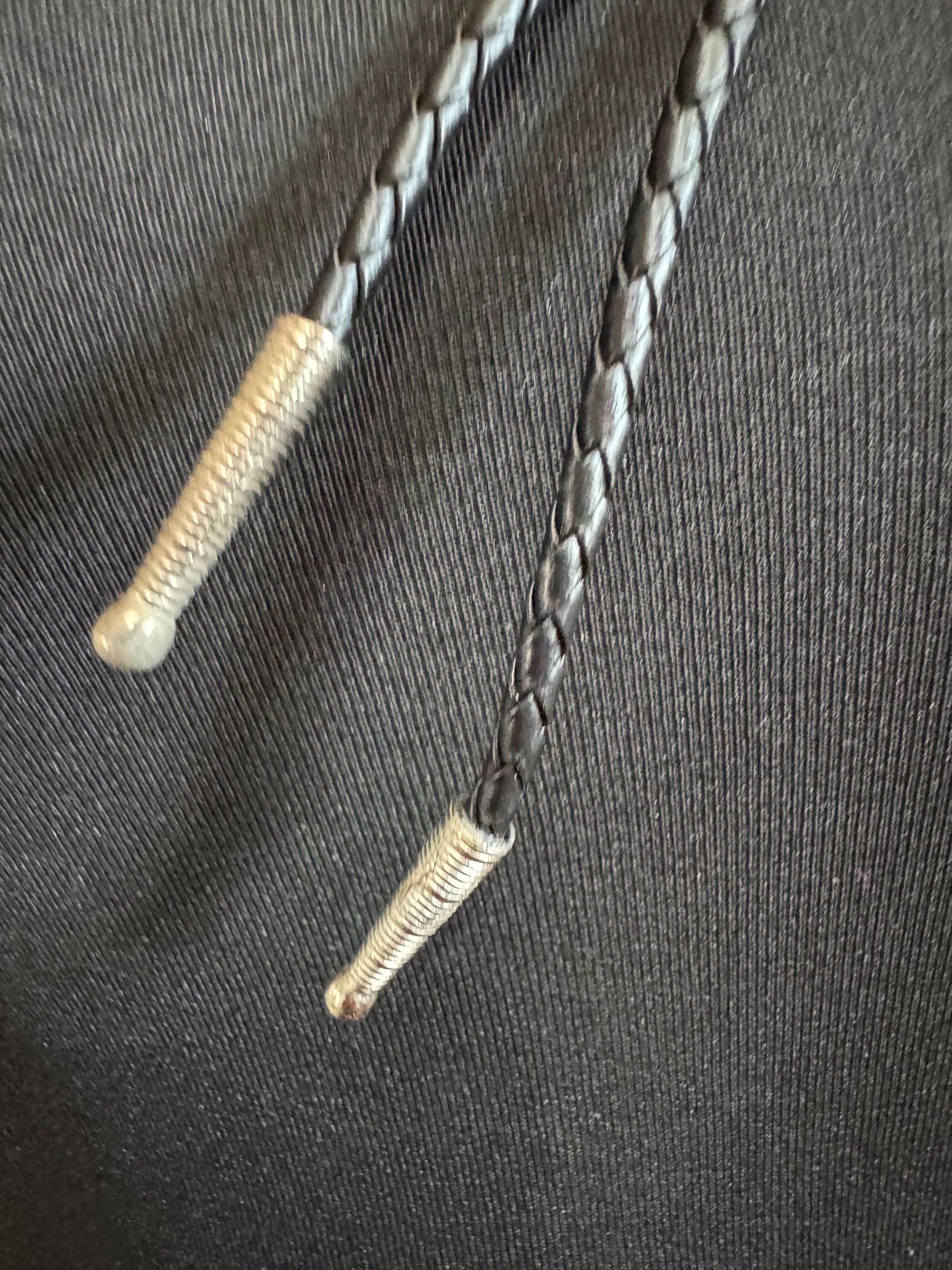 Retro silver tone south western style dream catcher bolo necklace on a leather cord