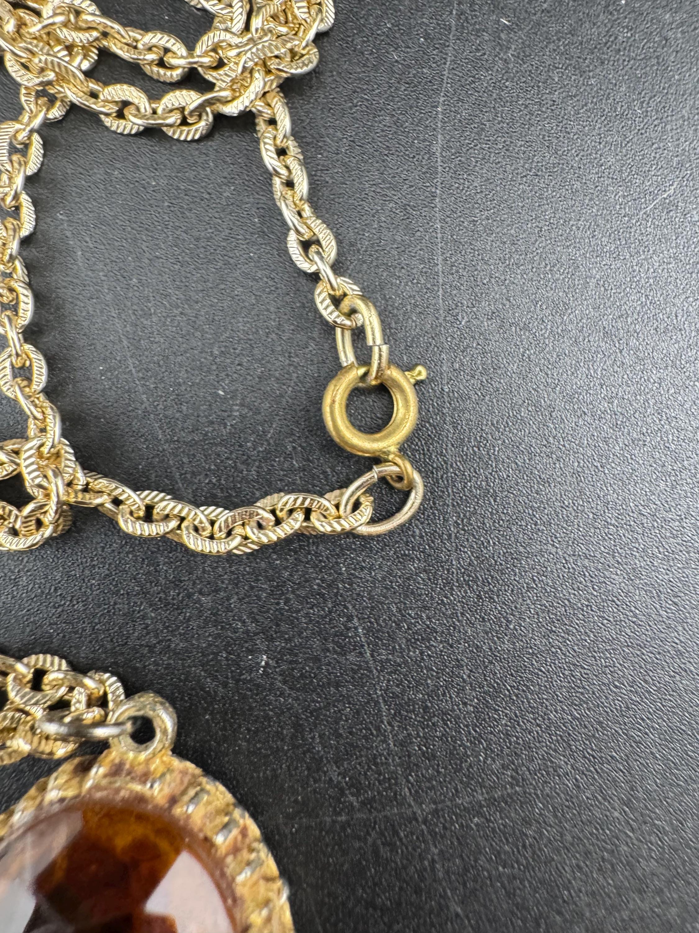 Vintage gold tone orange amber faceted Glass oval pendant necklace on 64cm chain