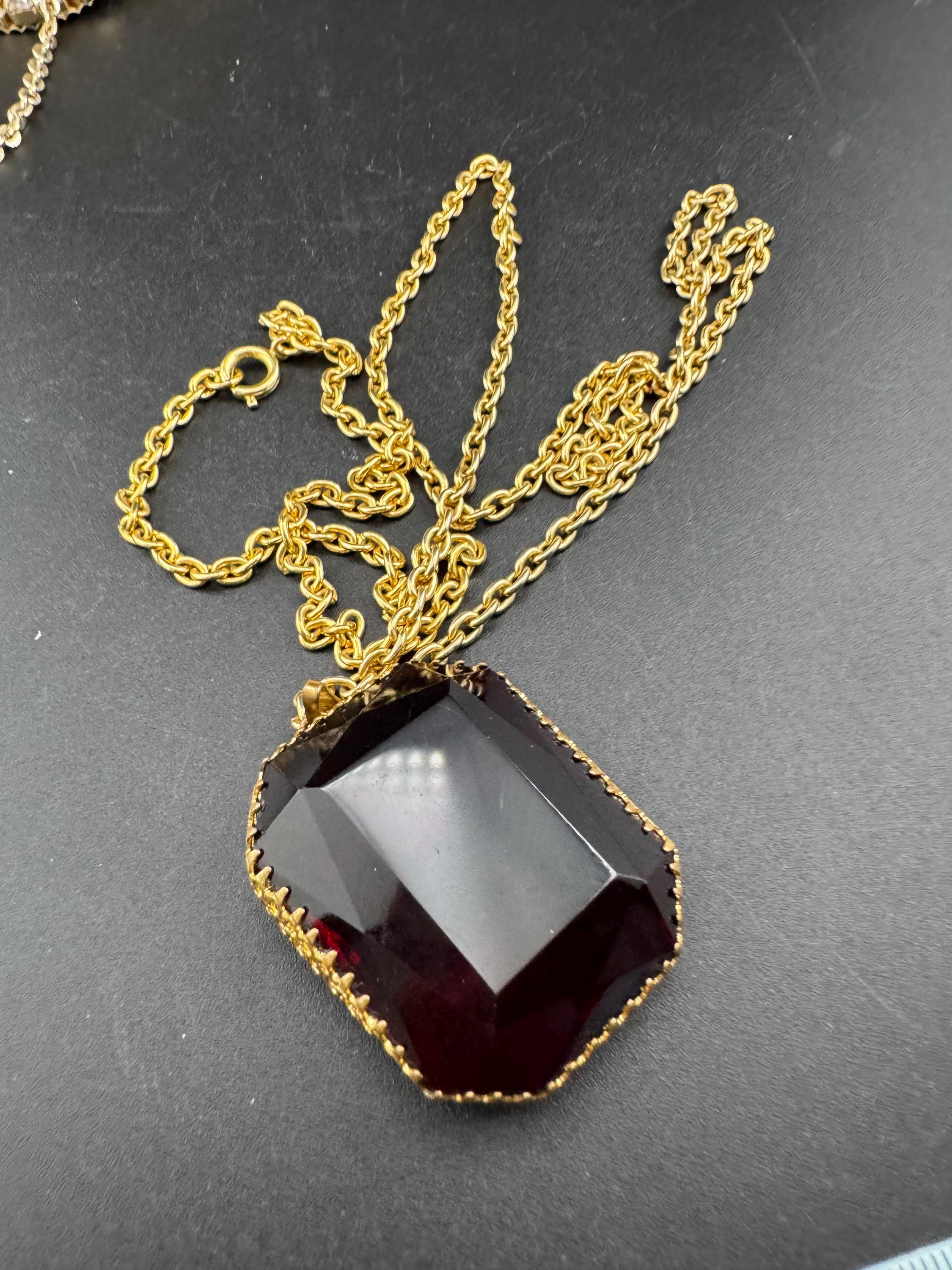 Modernist brutalist chunky gold tone ruby red glass pendant necklace on a 82cm chain