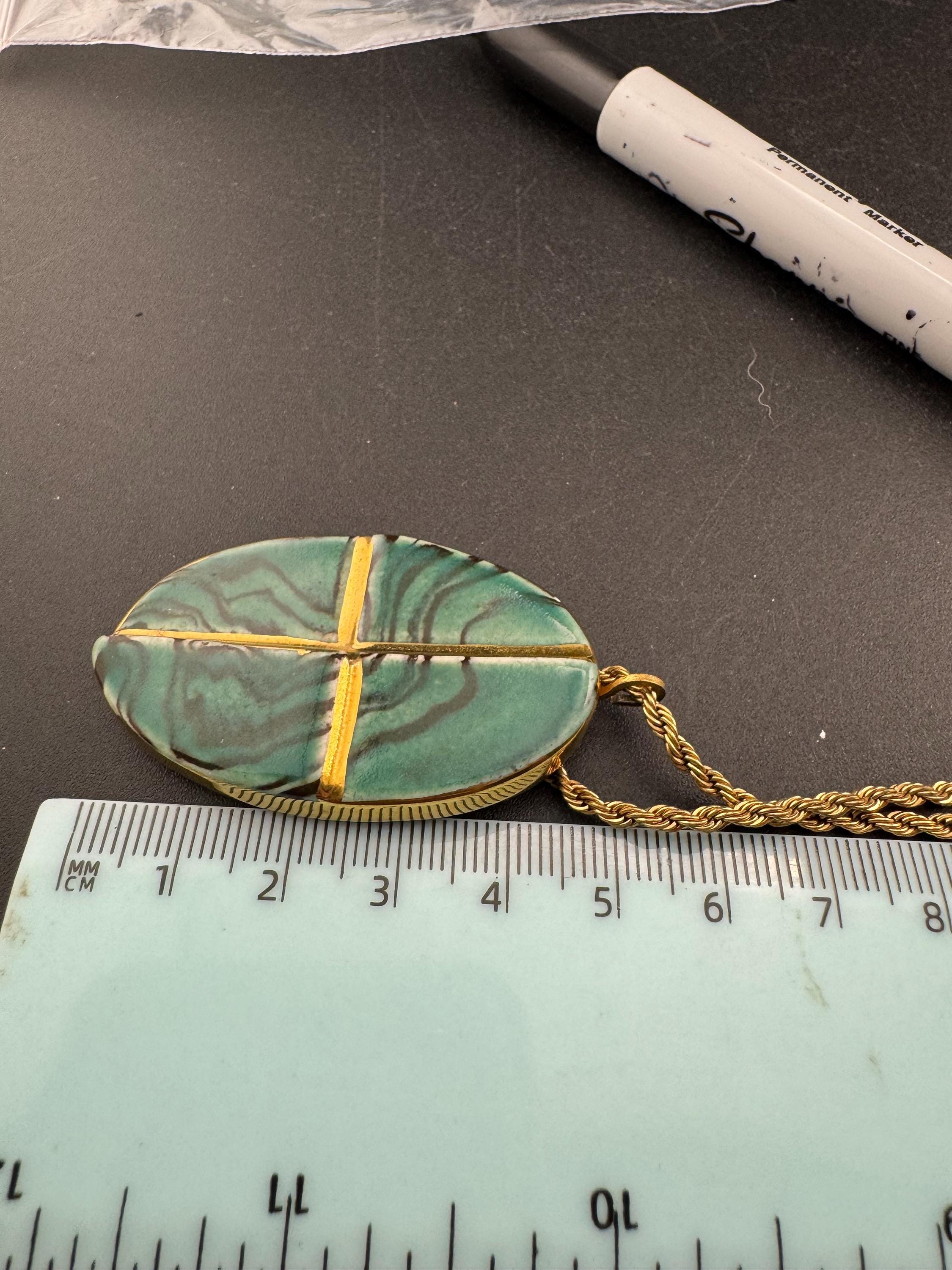 Vintage 1970s green and gold enamel pottery pendant necklace